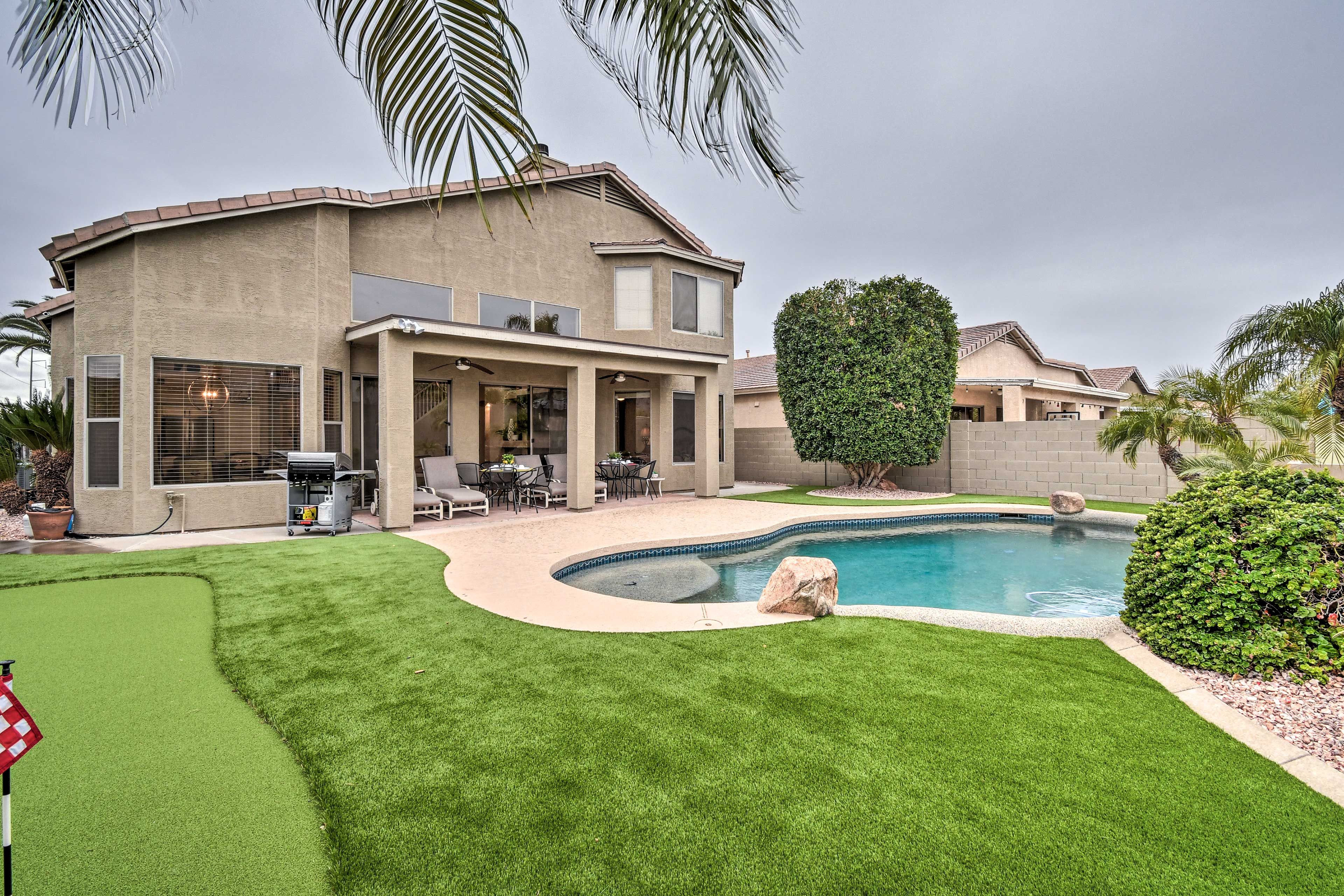 Back Exterior | Heated Pool (Depth 3'-6') | Putting Green | Mountain Views
