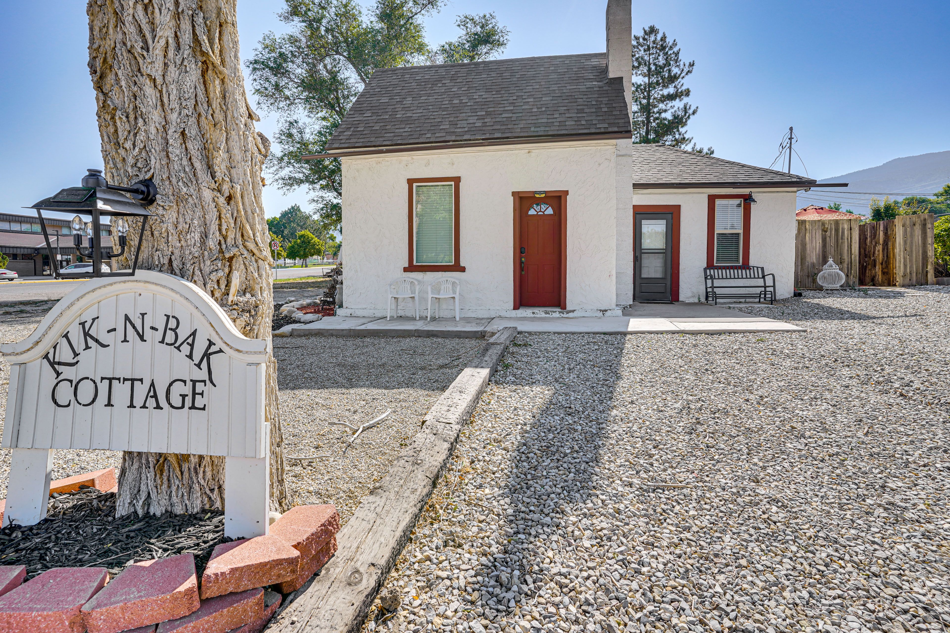 Cottage Exterior | Wooded Yard | Driveway Parking (2 Vehicles)