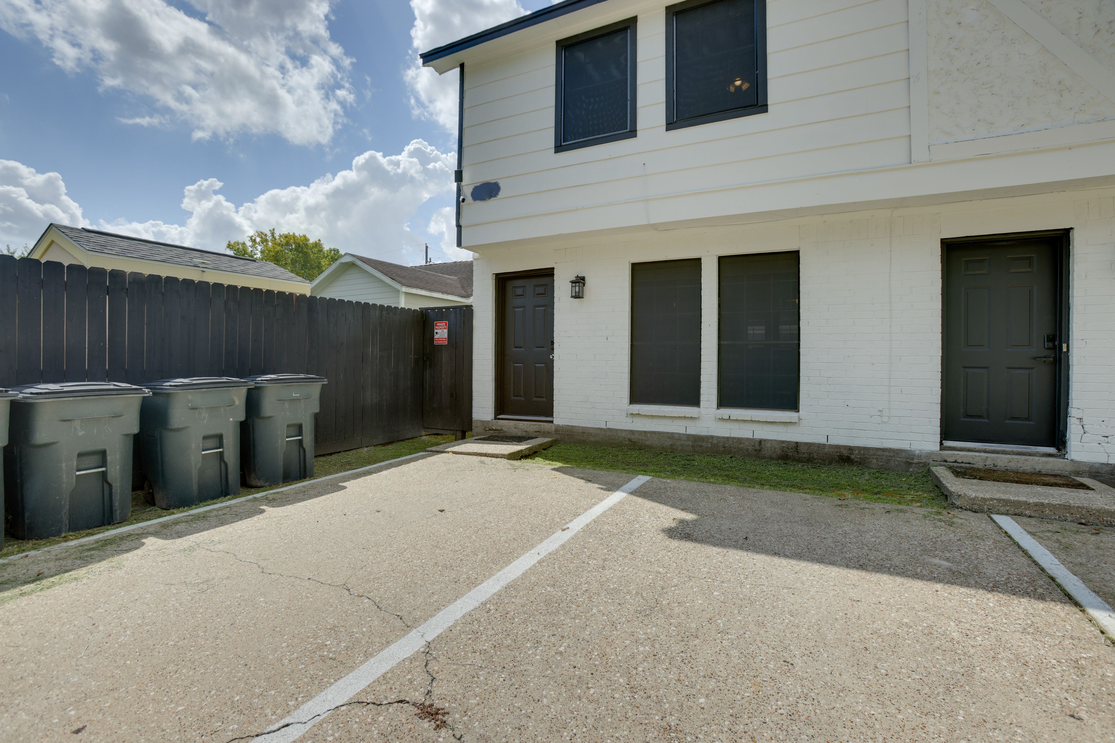 Property Exterior | Shared Parking Lot (2 Vehicles)