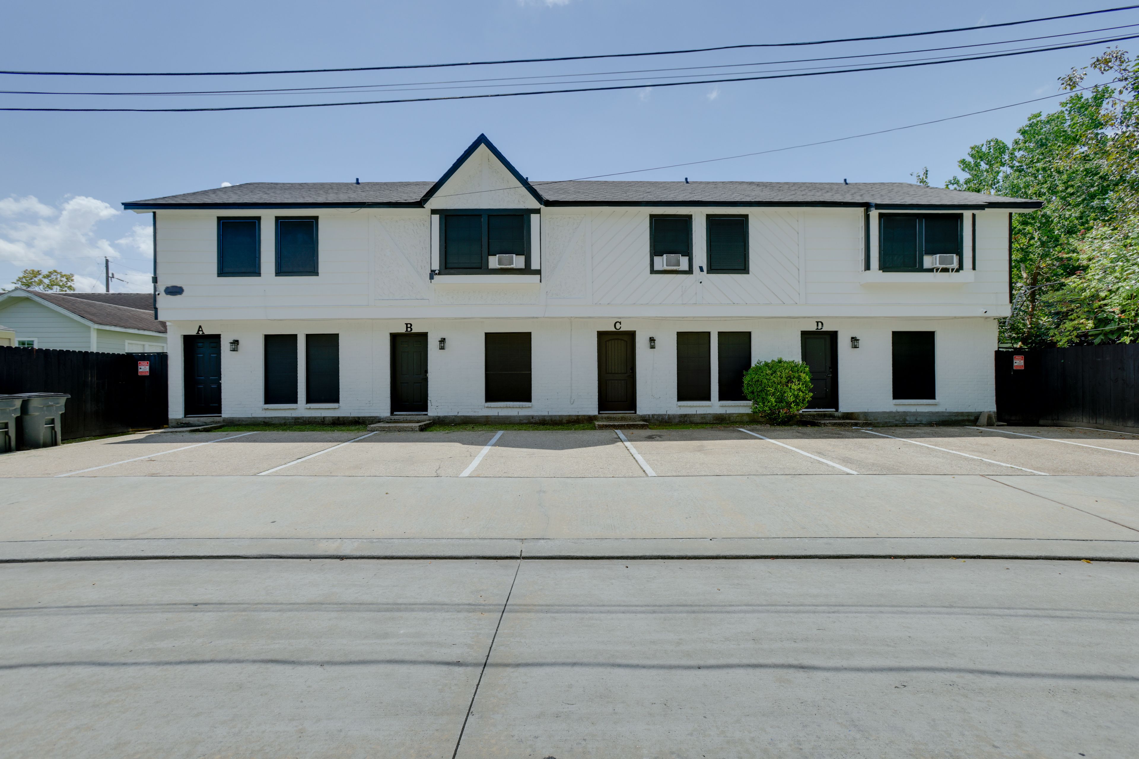 Property Exterior | Shared Parking Lot (2 Vehicles)