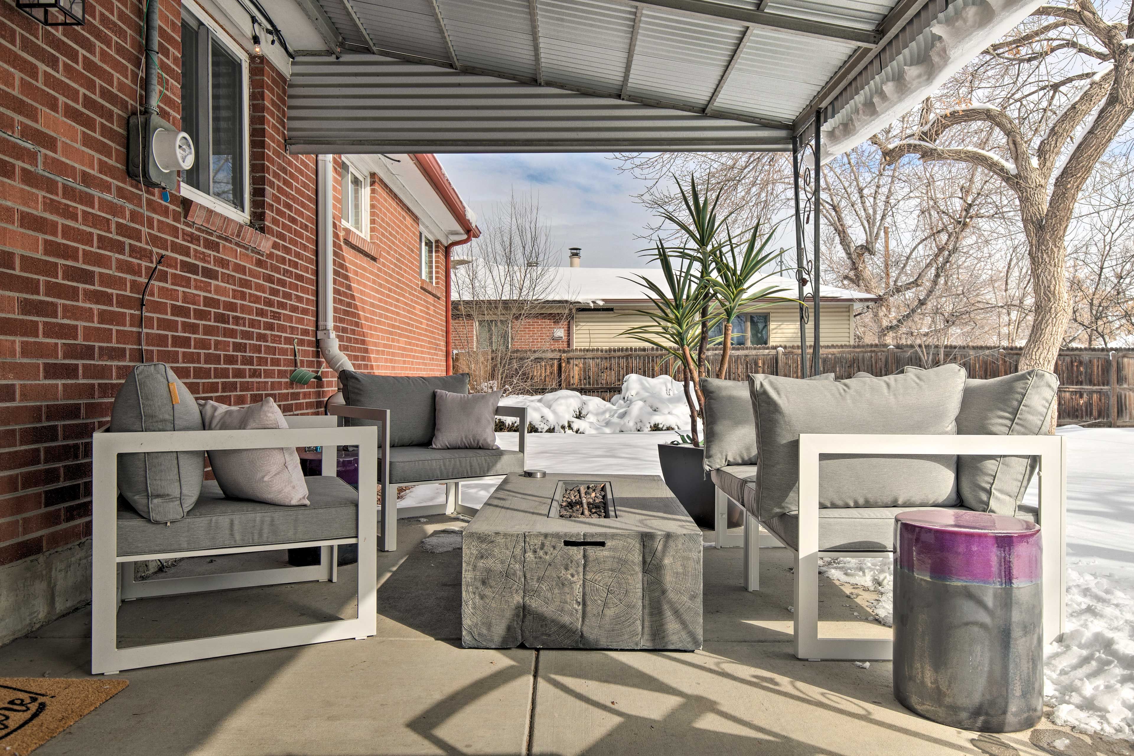 Backyard | Covered Patio w/ String Lights | Gas Fire Pit | Outdoor Dining Area