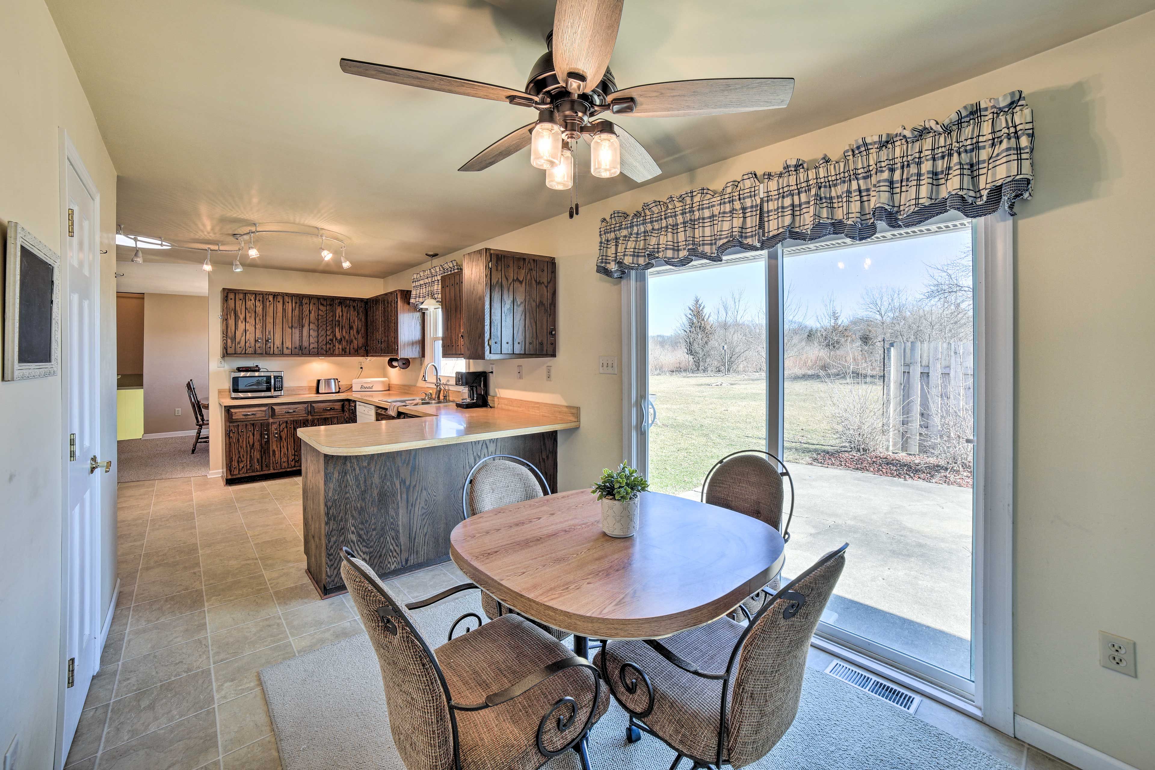 Kitchen & Dining Area | 2nd-Floor Bedrooms/Showers | Free WiFi | Towels & Linens