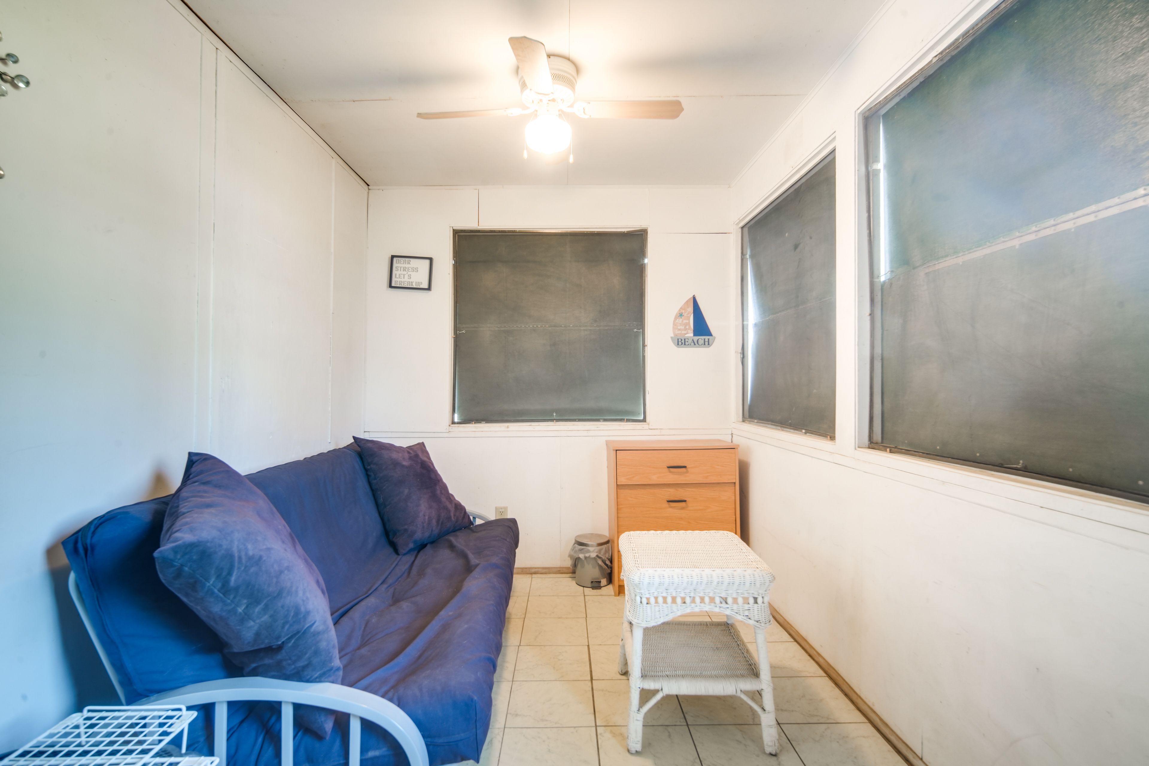 Screened-In Porch | Dining Table | Twin Futon