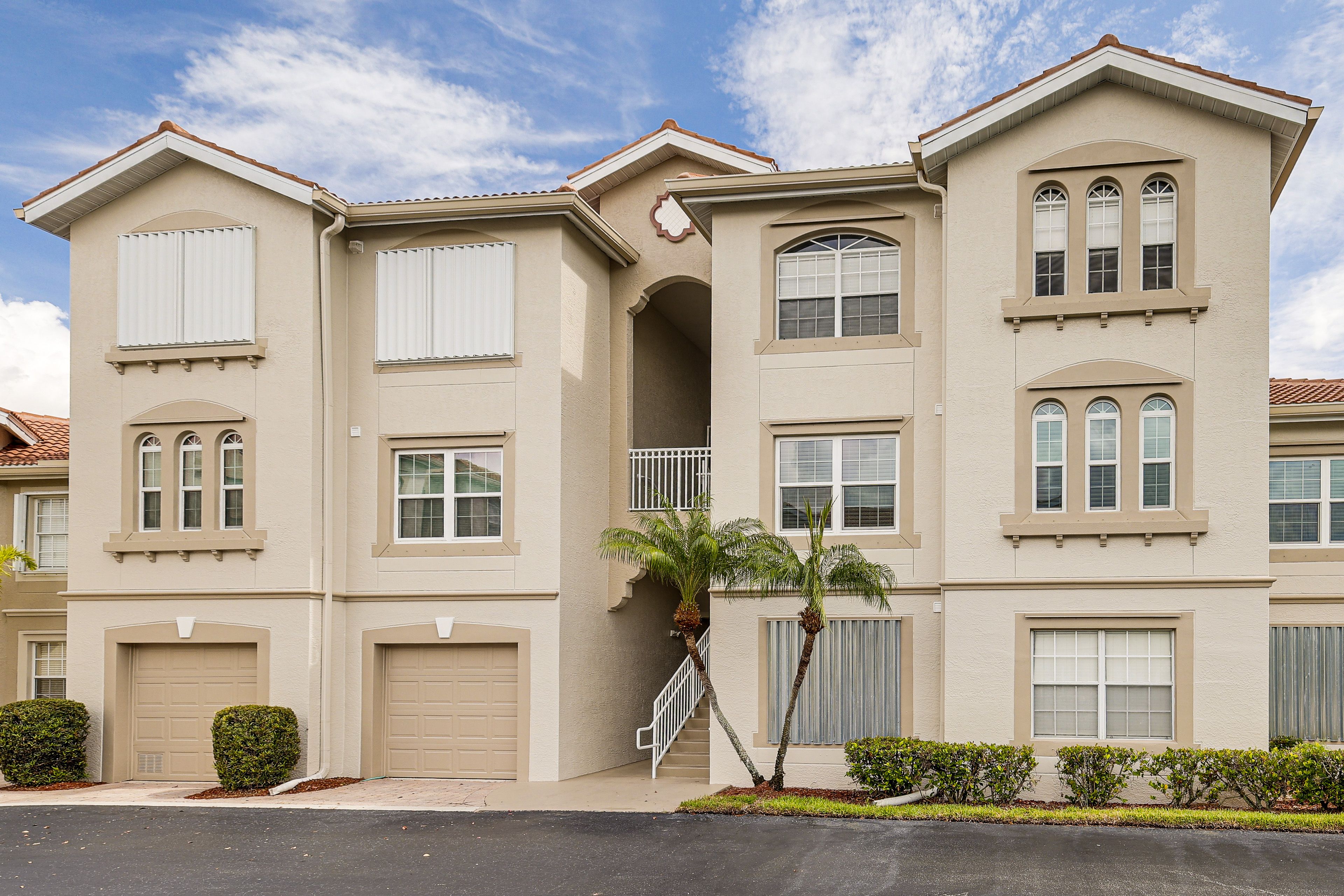 Building Exterior | 3rd-Floor Unit | Community Parking Lot (2 Vehicles)