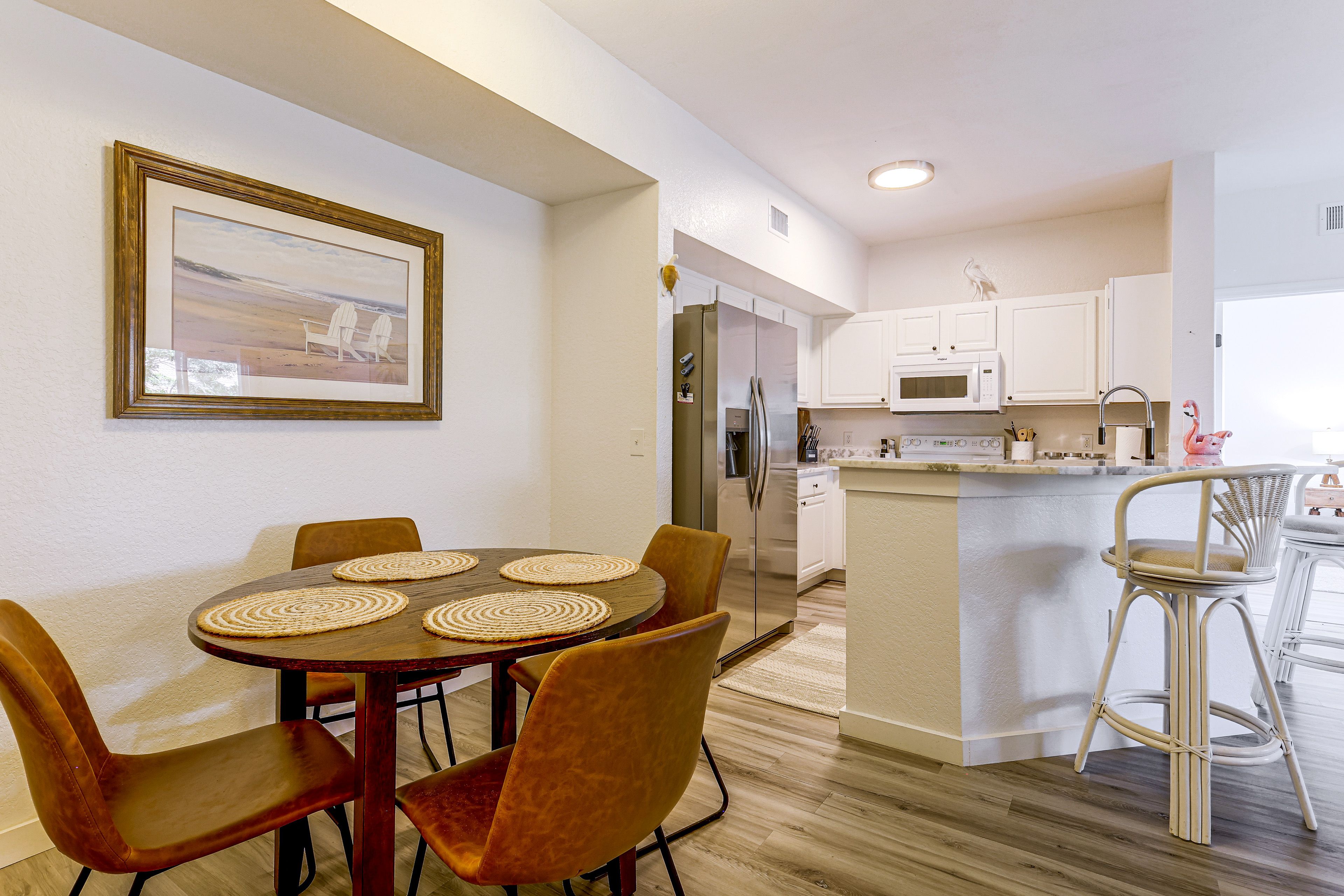 Dining Area | 3rd-Floor Unit | Open Floor Plan