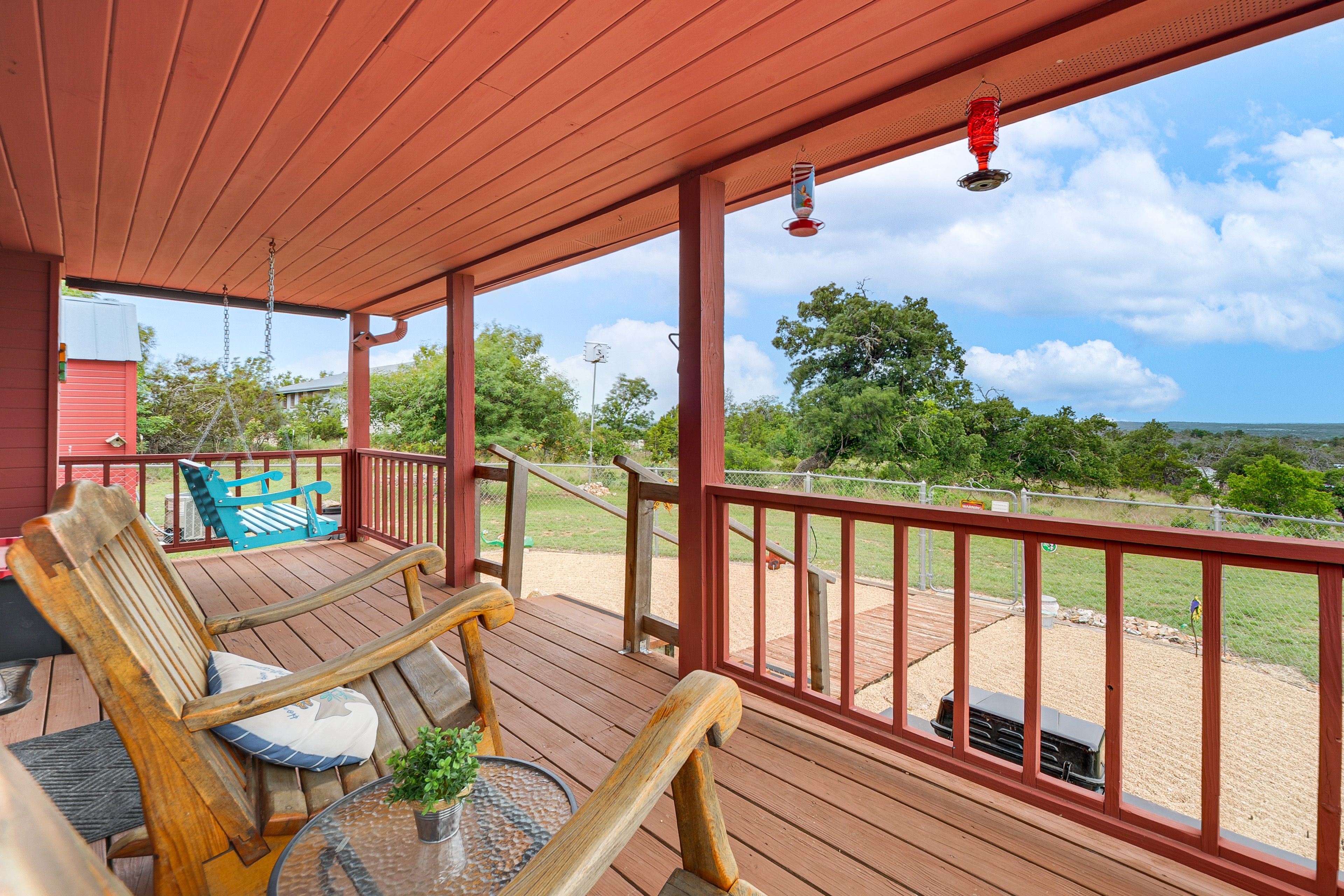 Back Porch | Fenced-In Yard | Private Hot Tub
