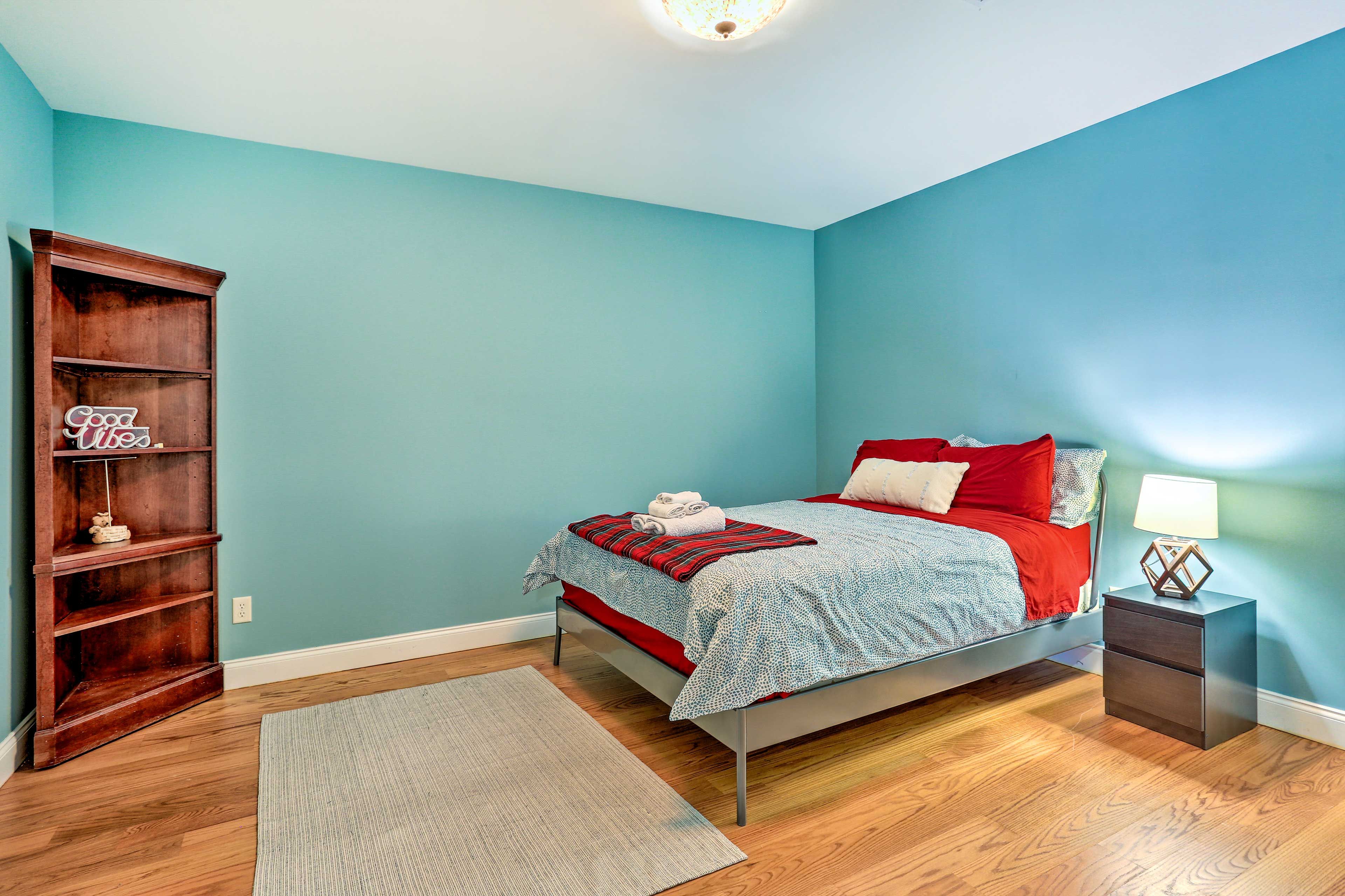 Bedroom 2 | Queen Bed | Books | Hangers | Iron/Board