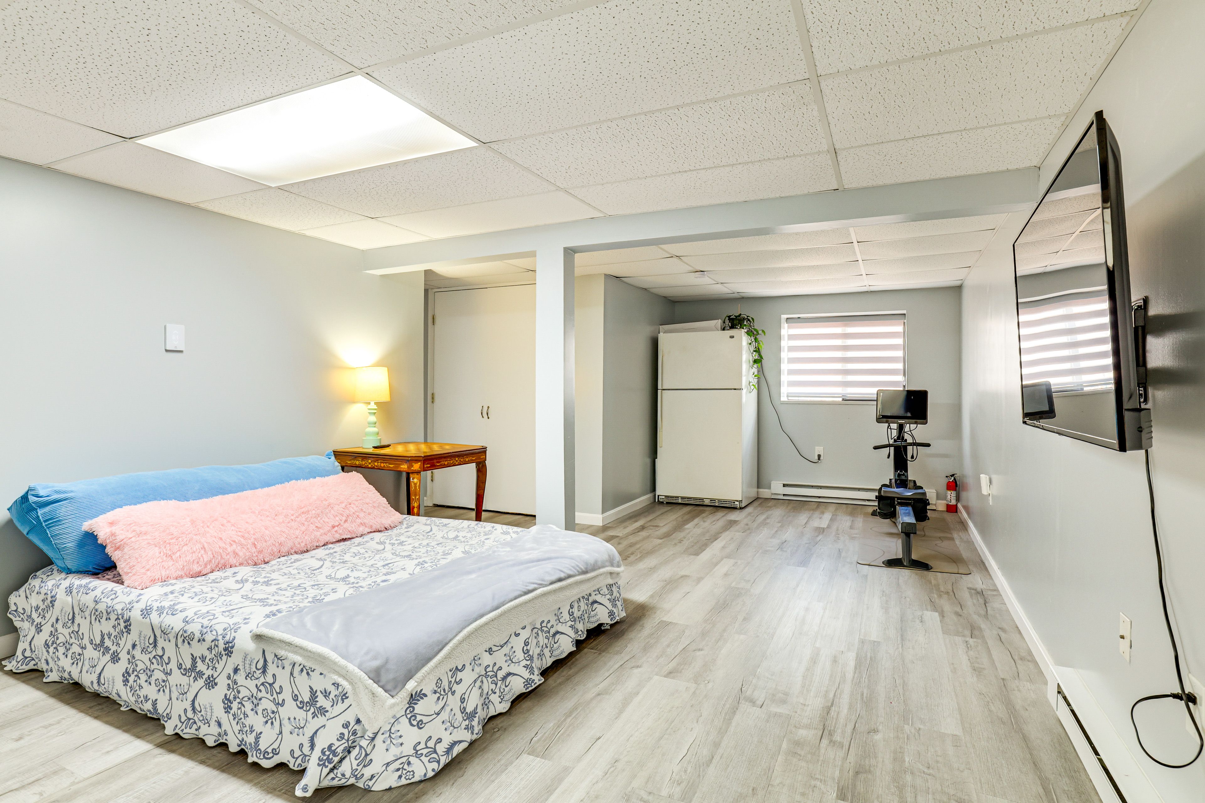 Finished Basement | Queen Air Mattress | Full Foam Mattress | Rowing Machine