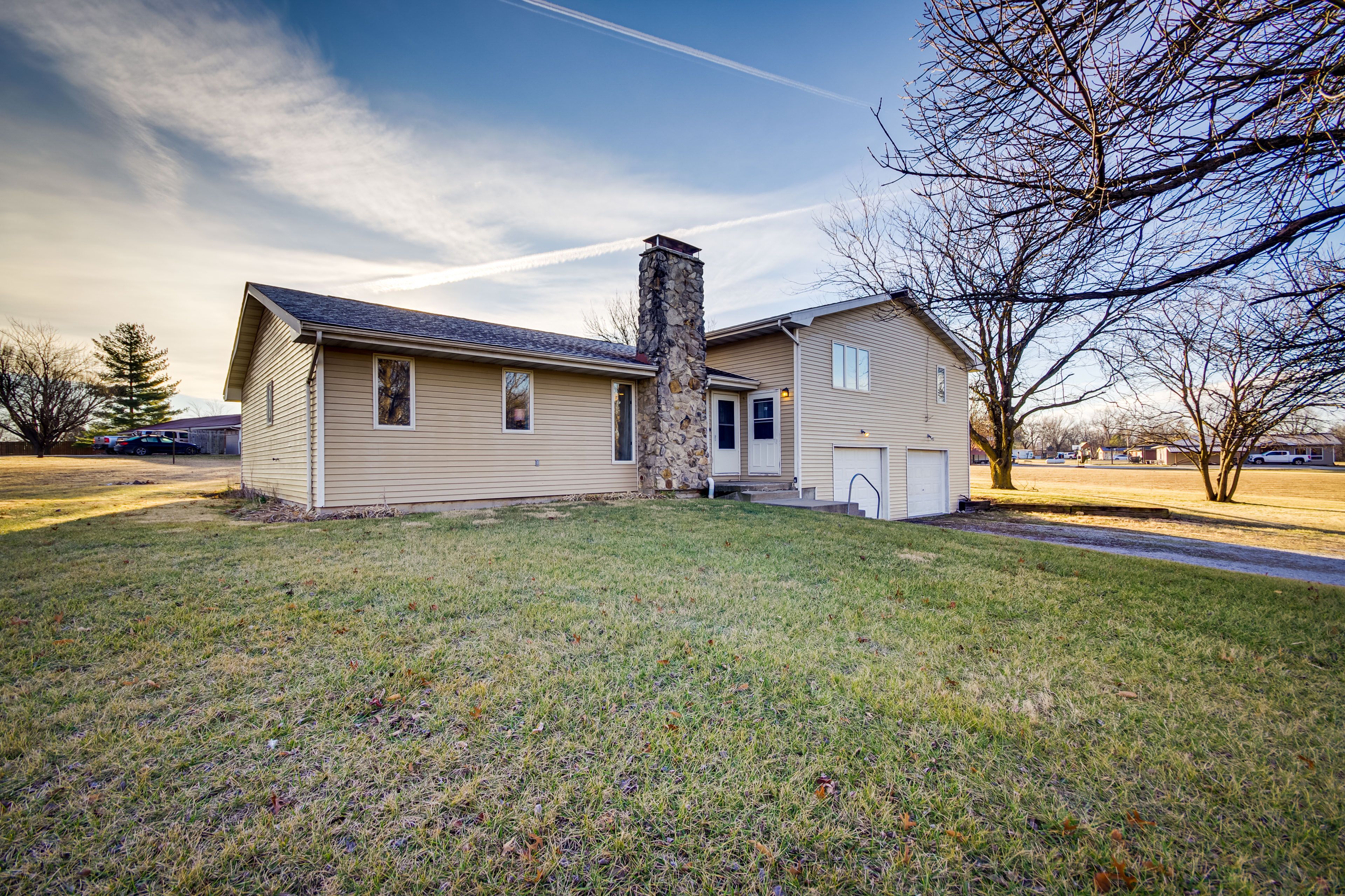 Duplex Townhome | Backyard Deck | 2 Miles to Lakes
