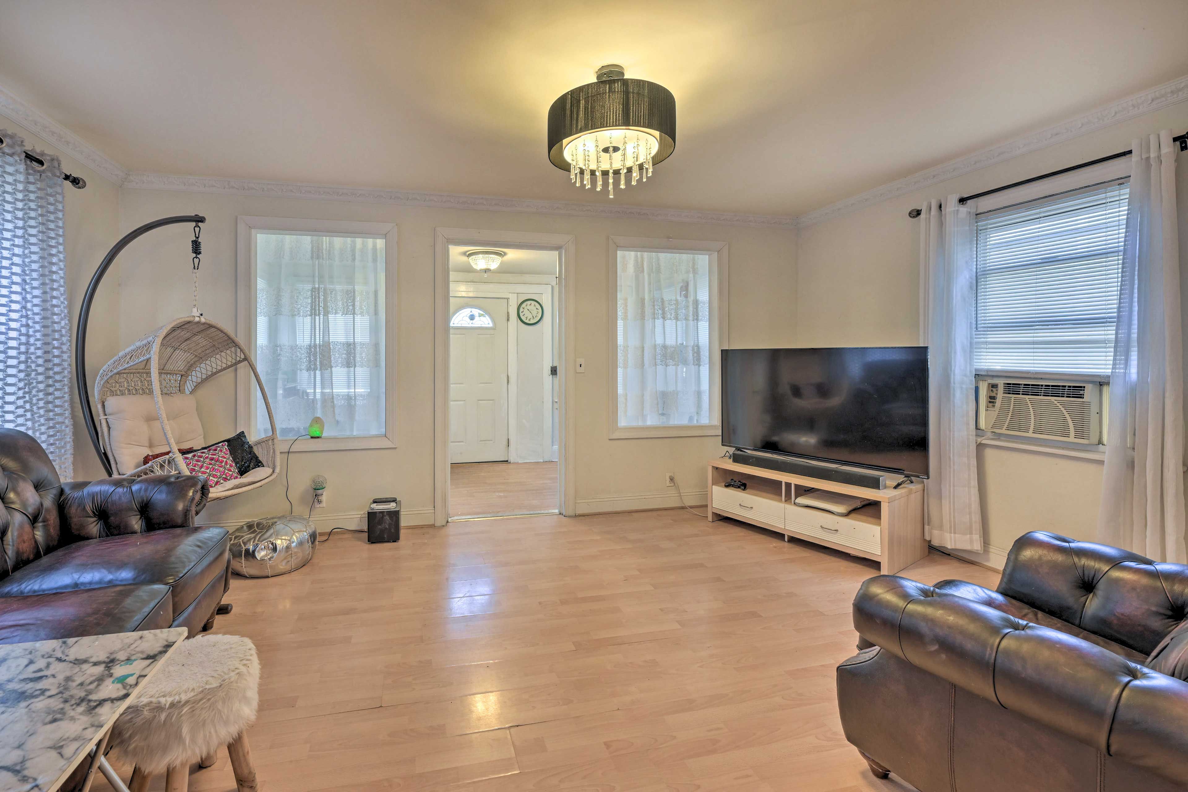 Living Room | Flat-Screen TV | Window A/C Units