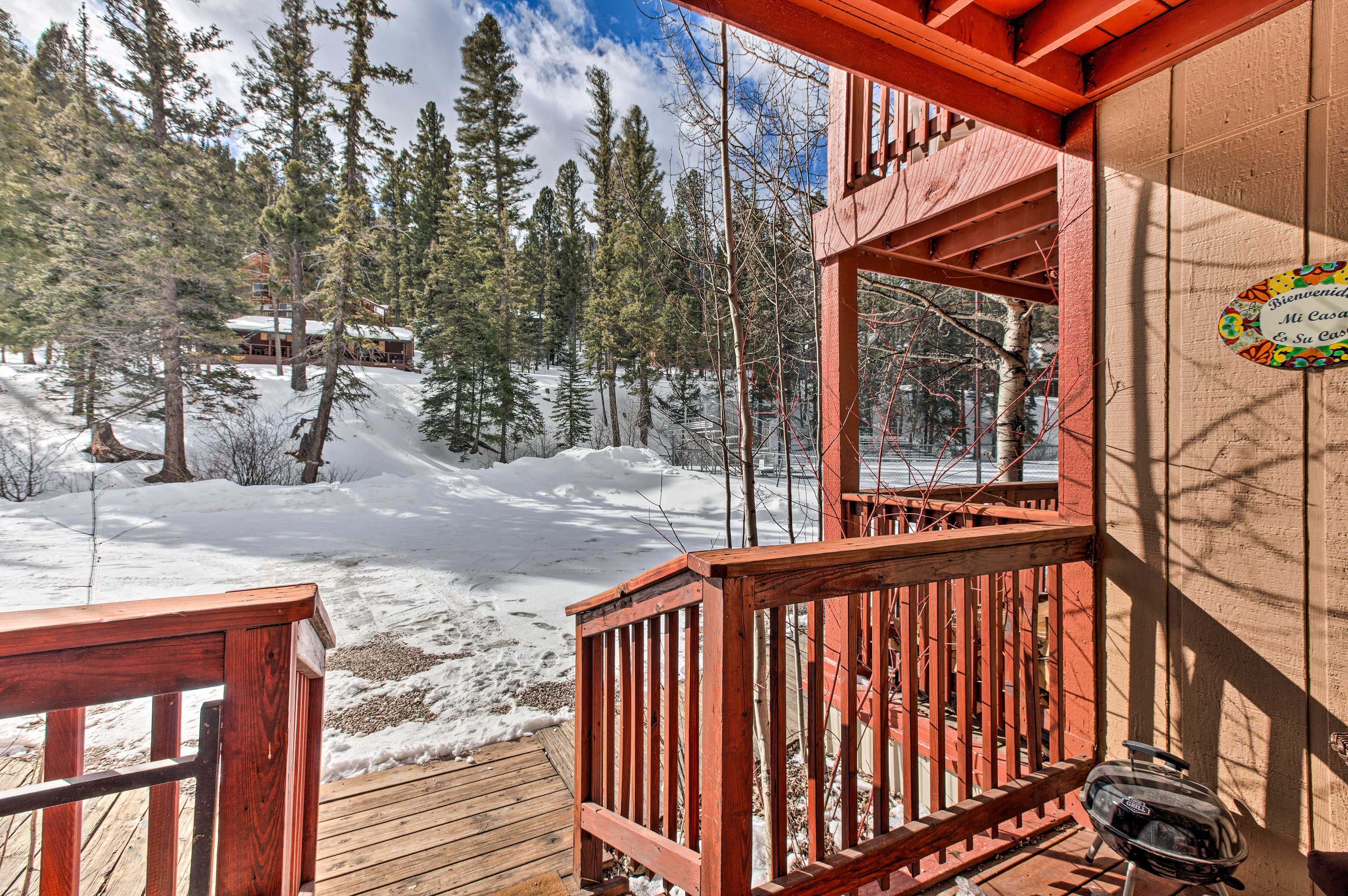 Condo Exterior | Furnished Deck | Charcoal Grill