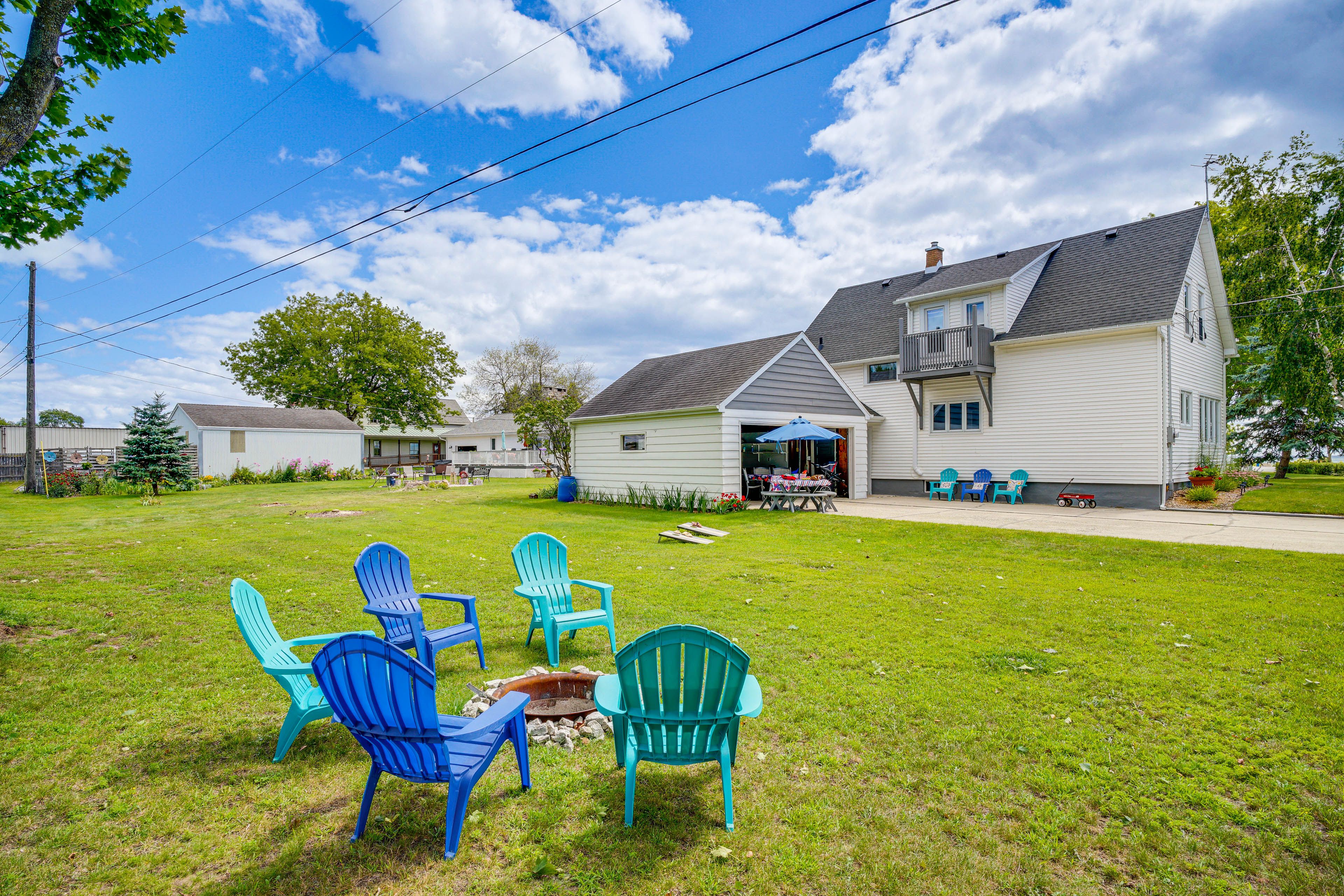 Exterior | Spacious Yard | Fire Pit w/ Seating | Outdoor Dining | Yard Games