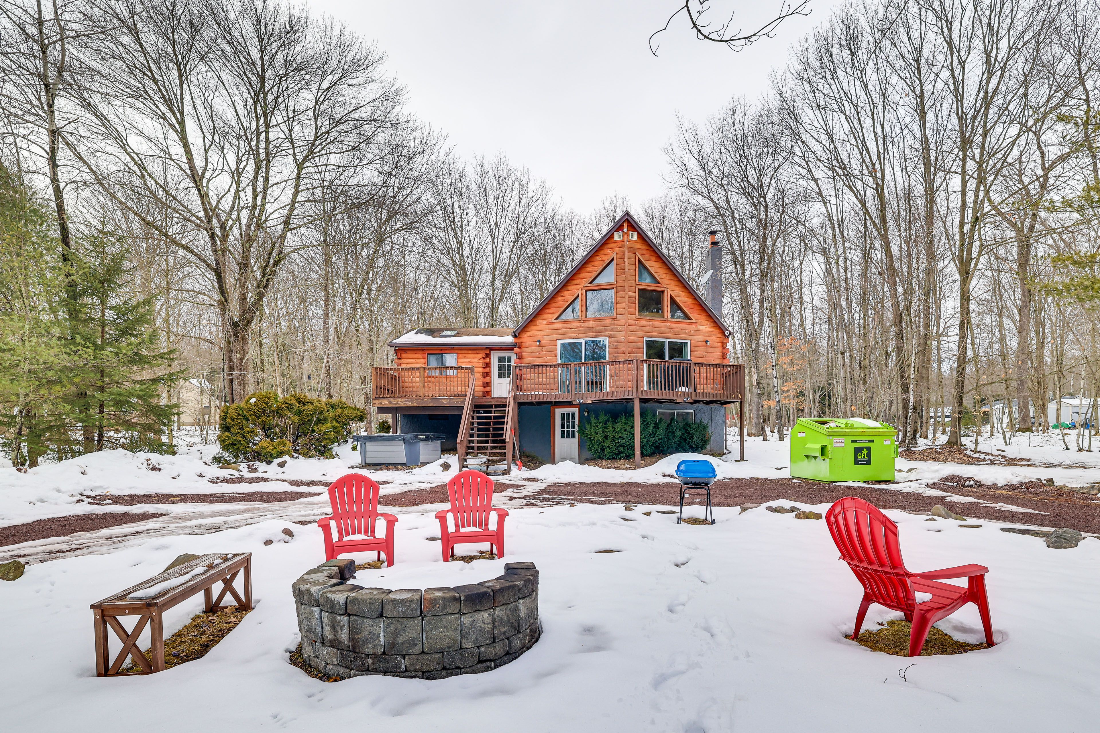 Cabin Exterior | Wood-Burning Fire Pit | Lounge Seating
