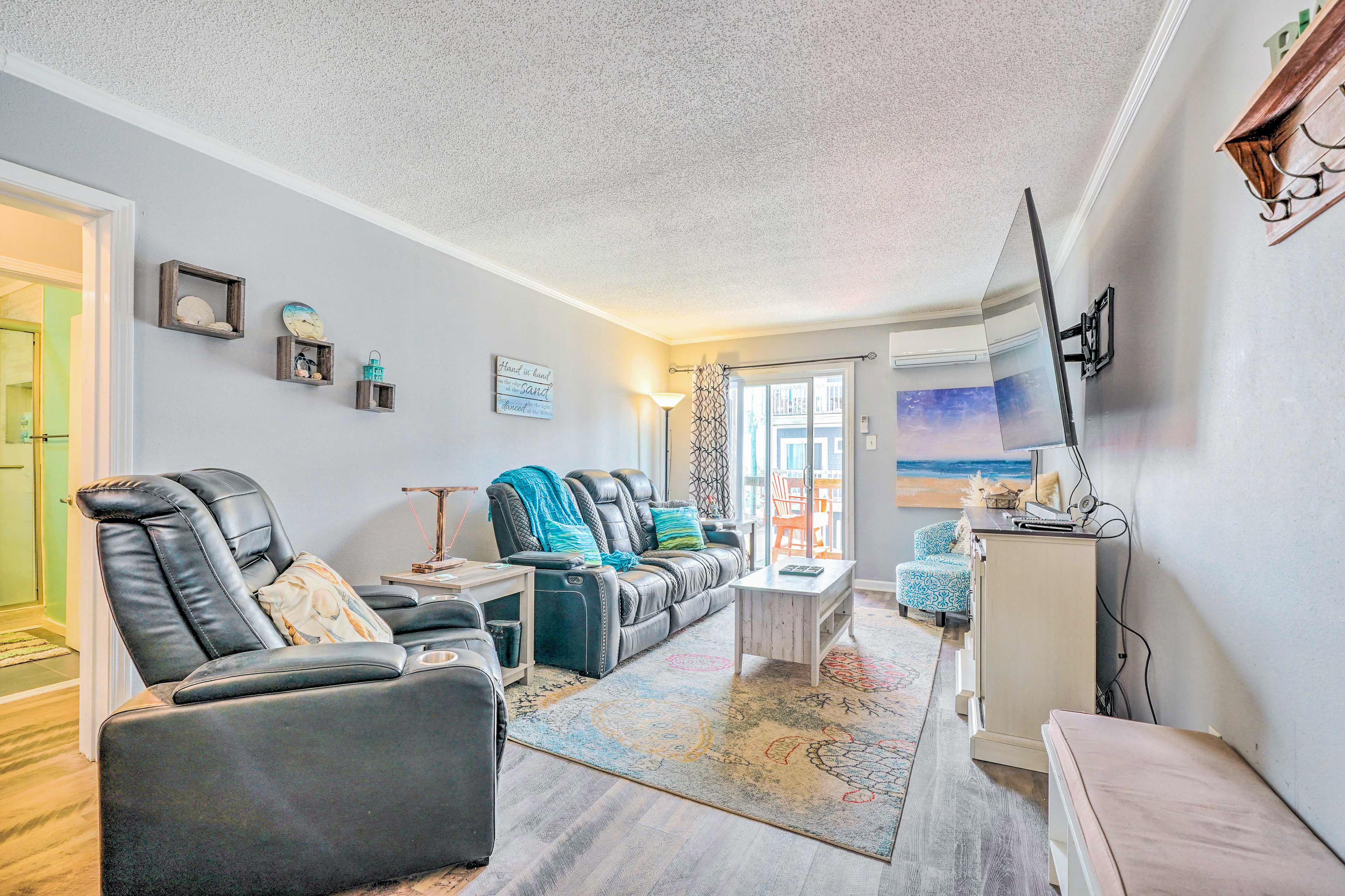 Living Room | 75" Smart TV w/ Streaming | Full-Motion Reclining Sofa