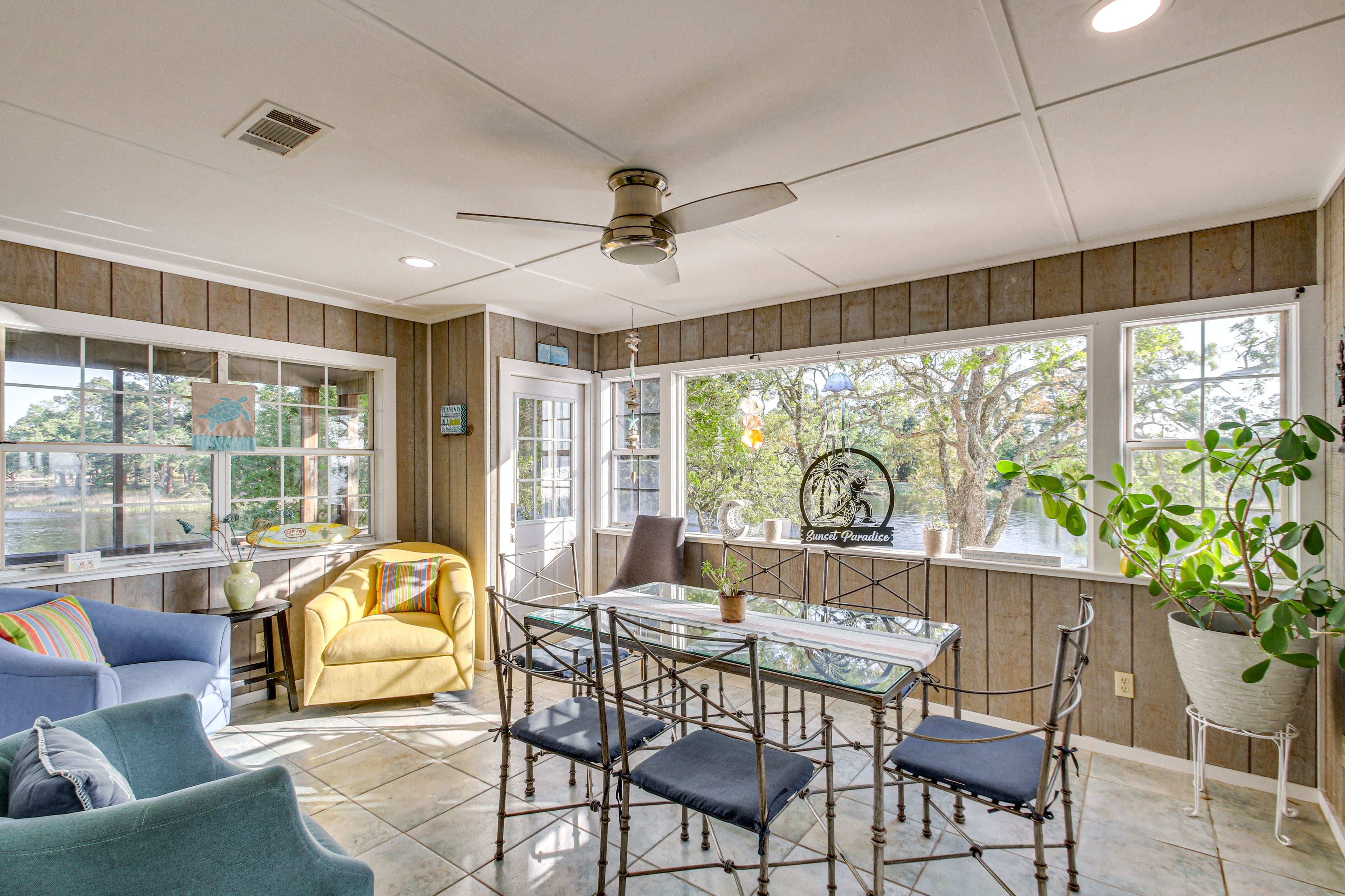 Dining Area | Dishware & Flatware | Central A/C & Heat | 1st Floor