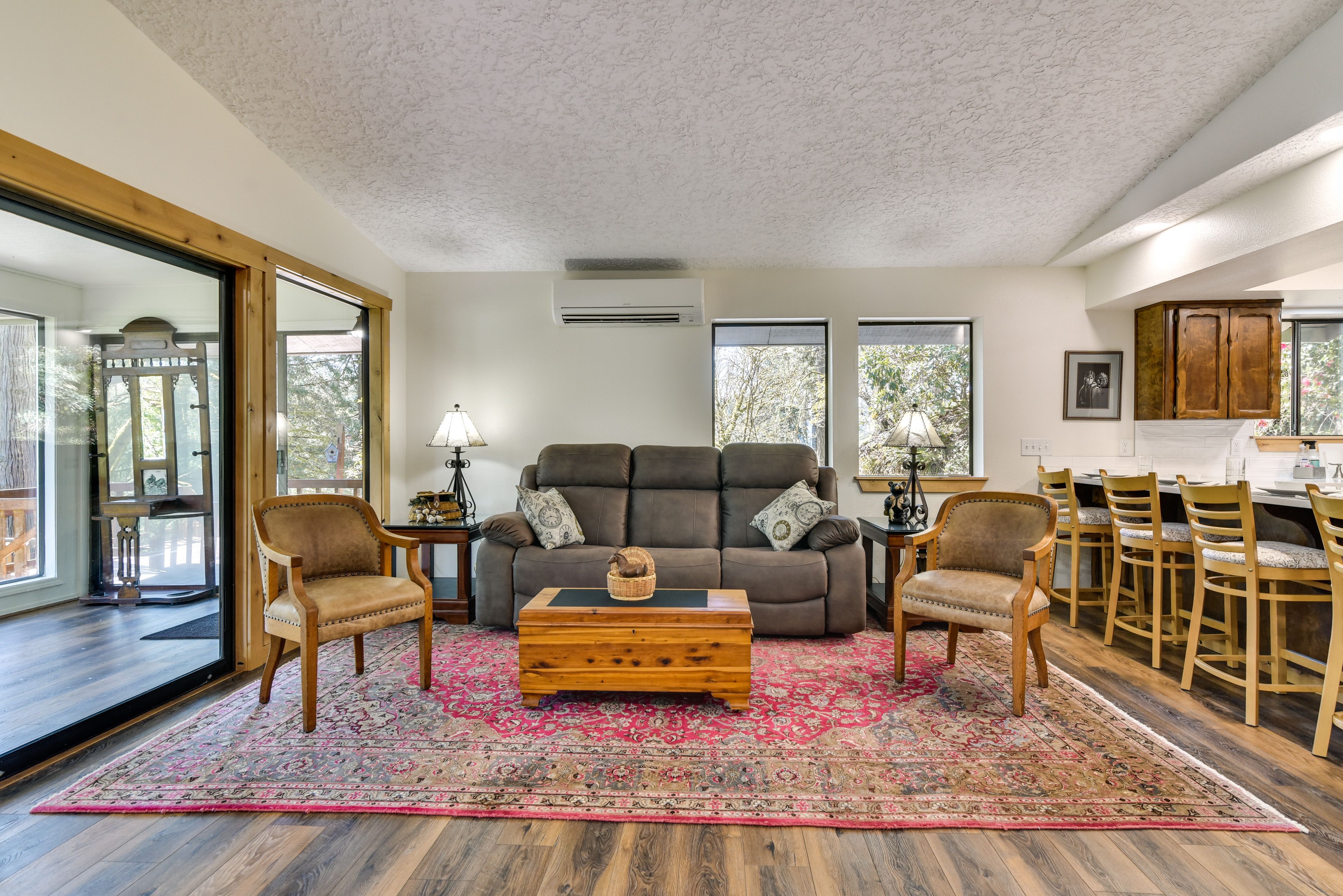 Living Room | Smart TV | Wood-Burning Stove | Queen Murphy Bed | Central A/C