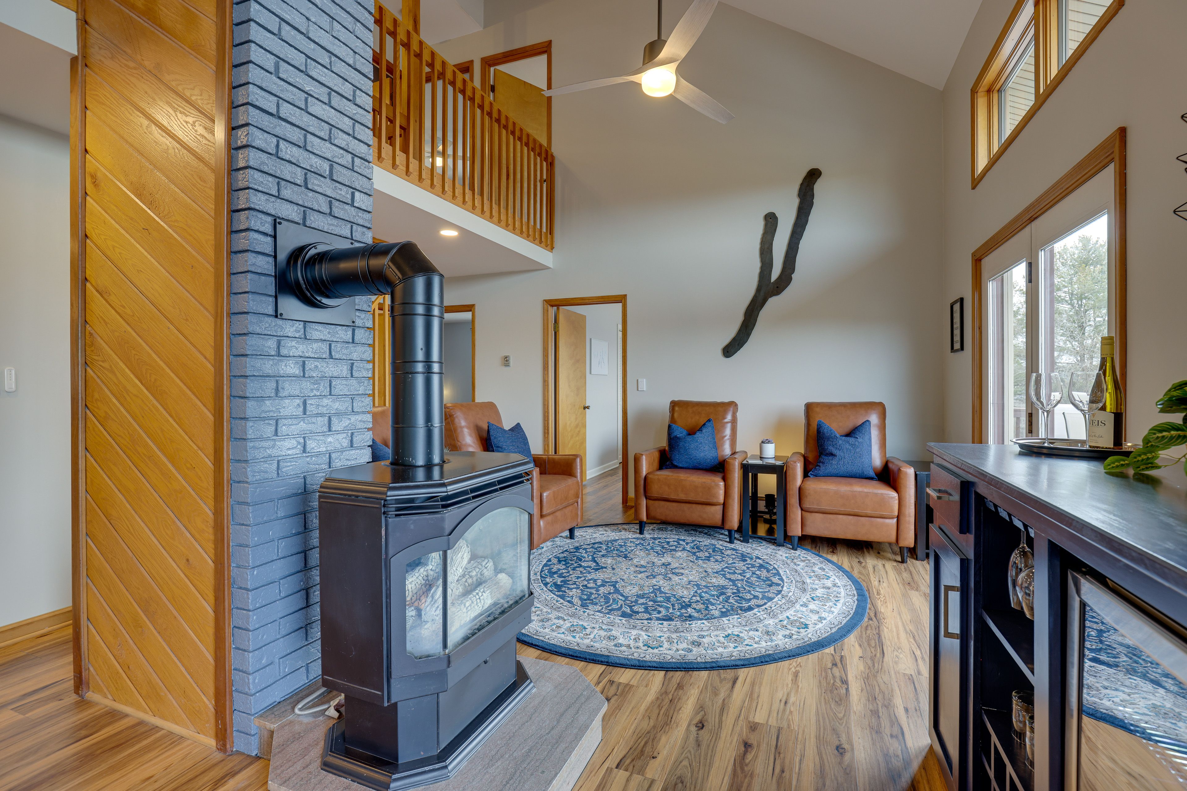 Sitting Area | 1st Floor | Fireplace | Dry Bar w/ Beverage Fridge