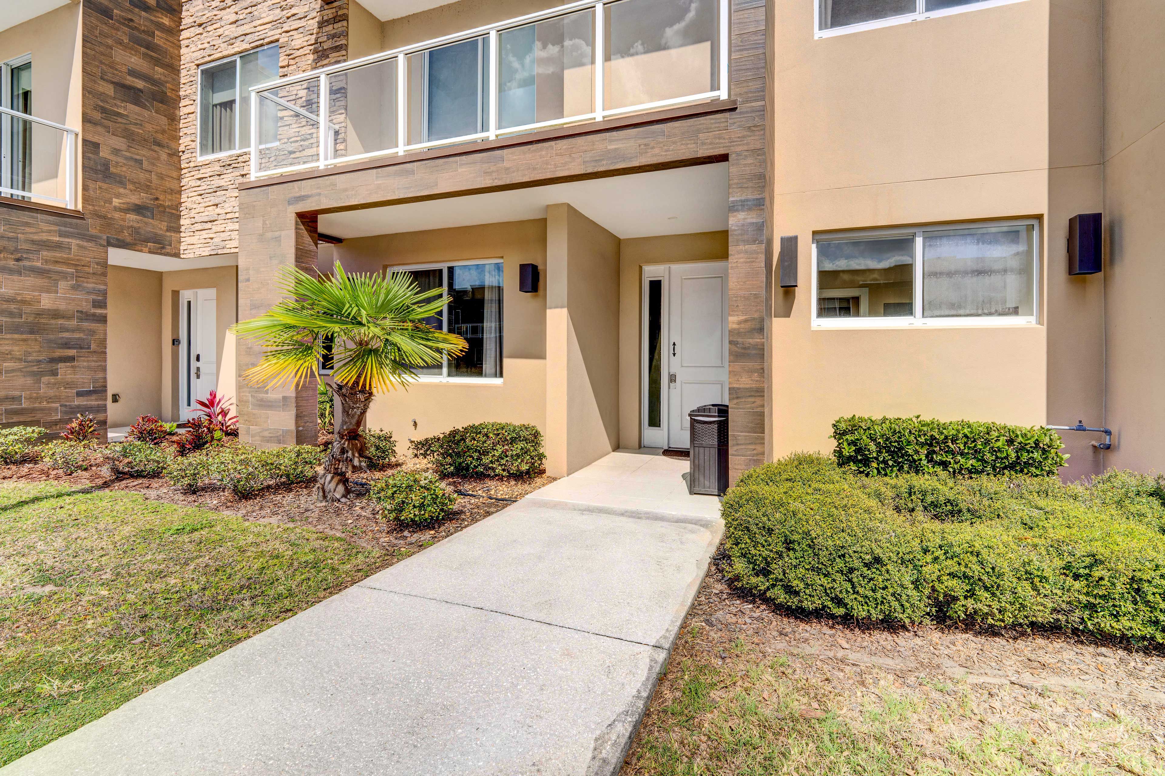 Townhome Exterior | Parking | Community Lot (2 Vehicles) | Free Street