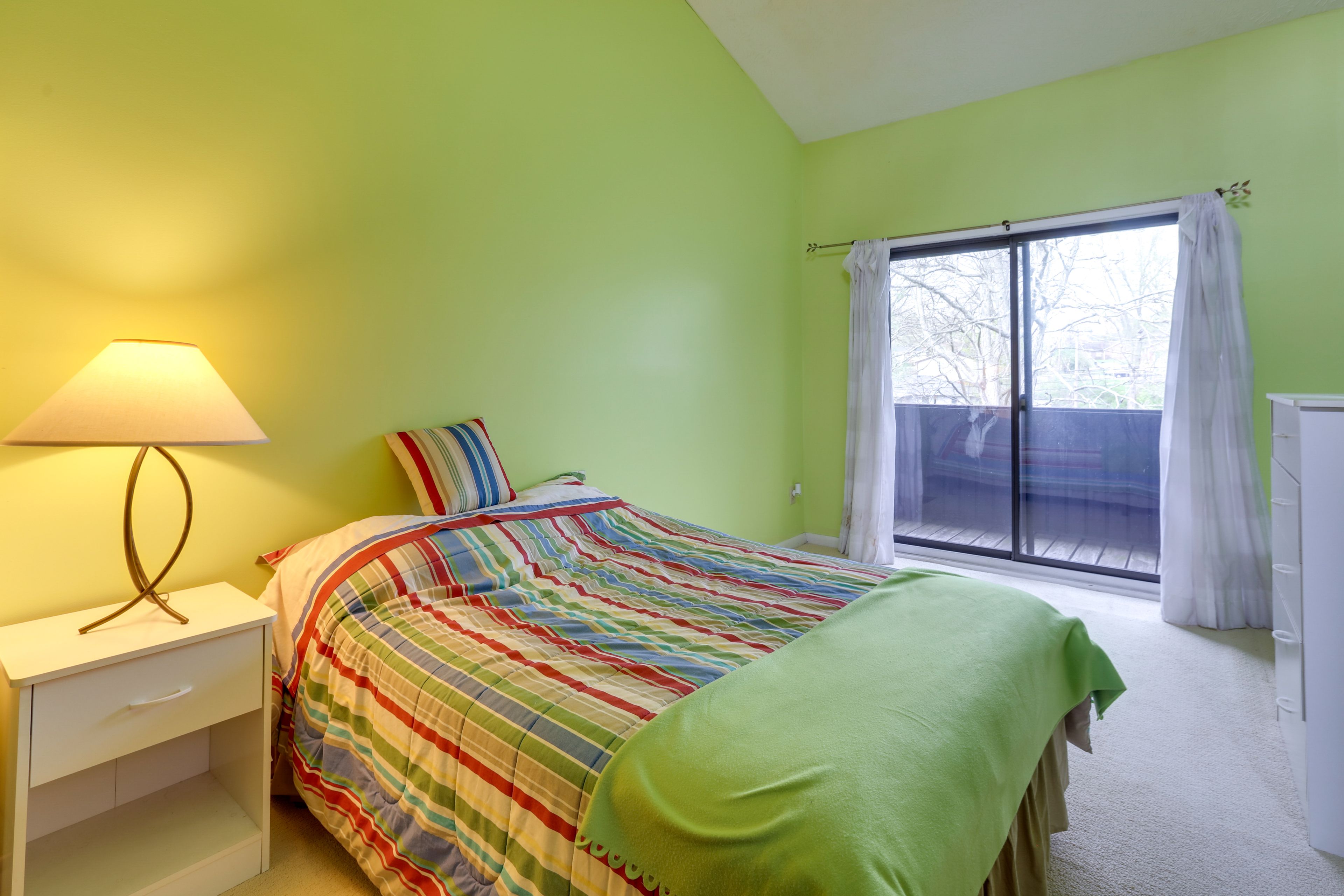 Bedroom 1 | Full Bed | Private Balcony | Vaulted Ceilings