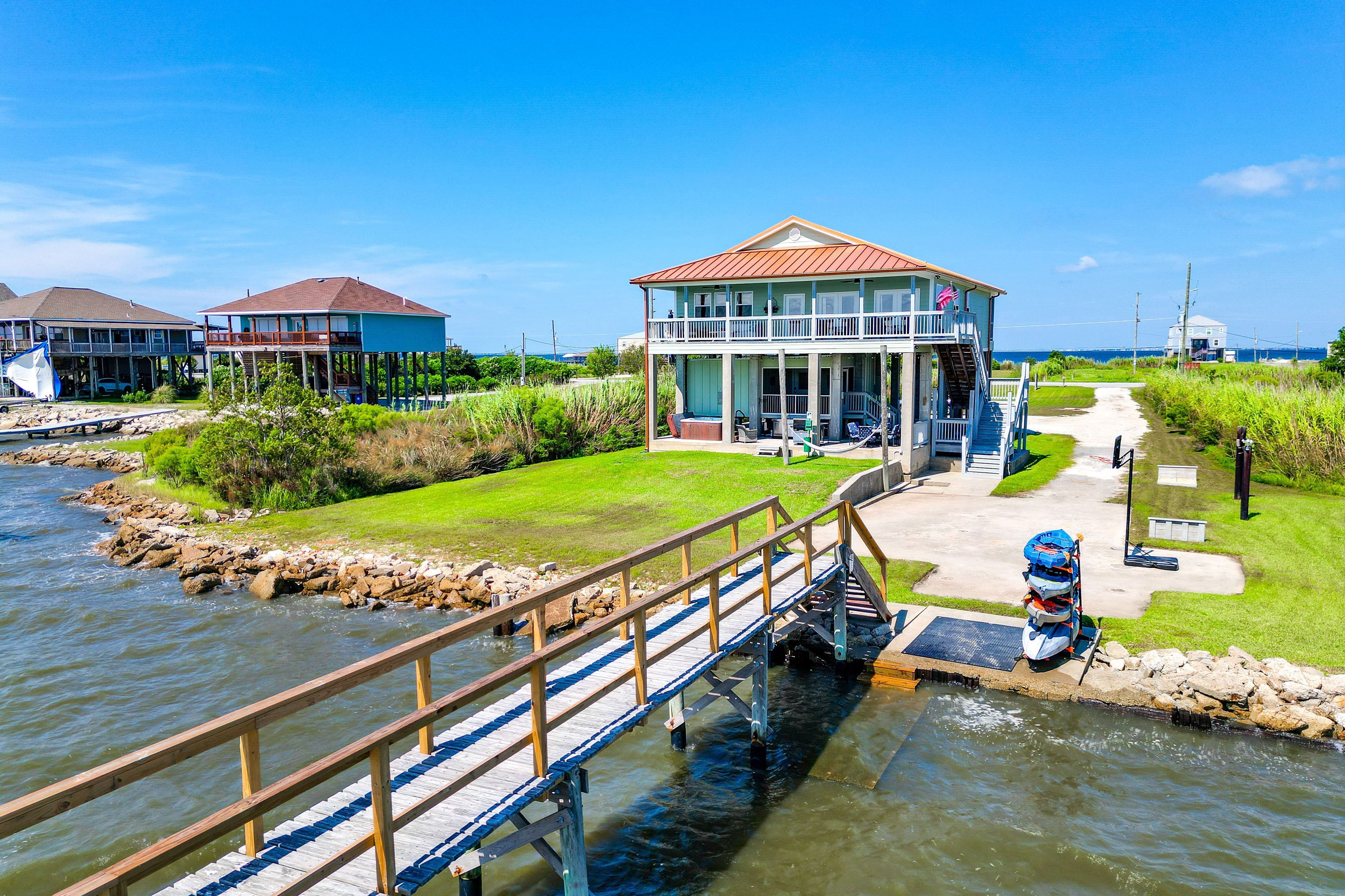Exterior | Covered Parking (3 Vehicles) | Driveway (4 Vehicles) | Boat Dock
