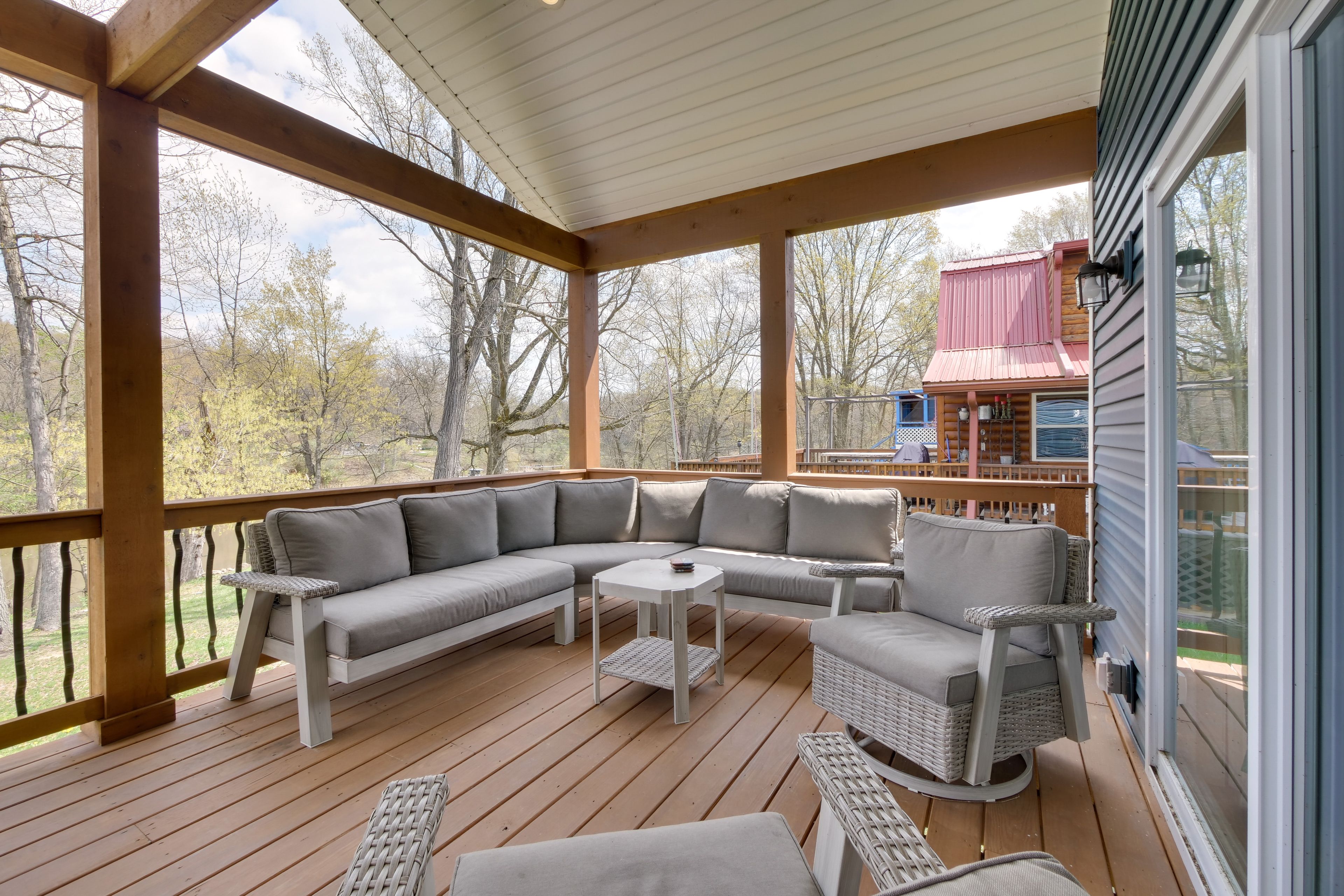 Covered Deck | Lounge Area | Outdoor Dining | Water Views