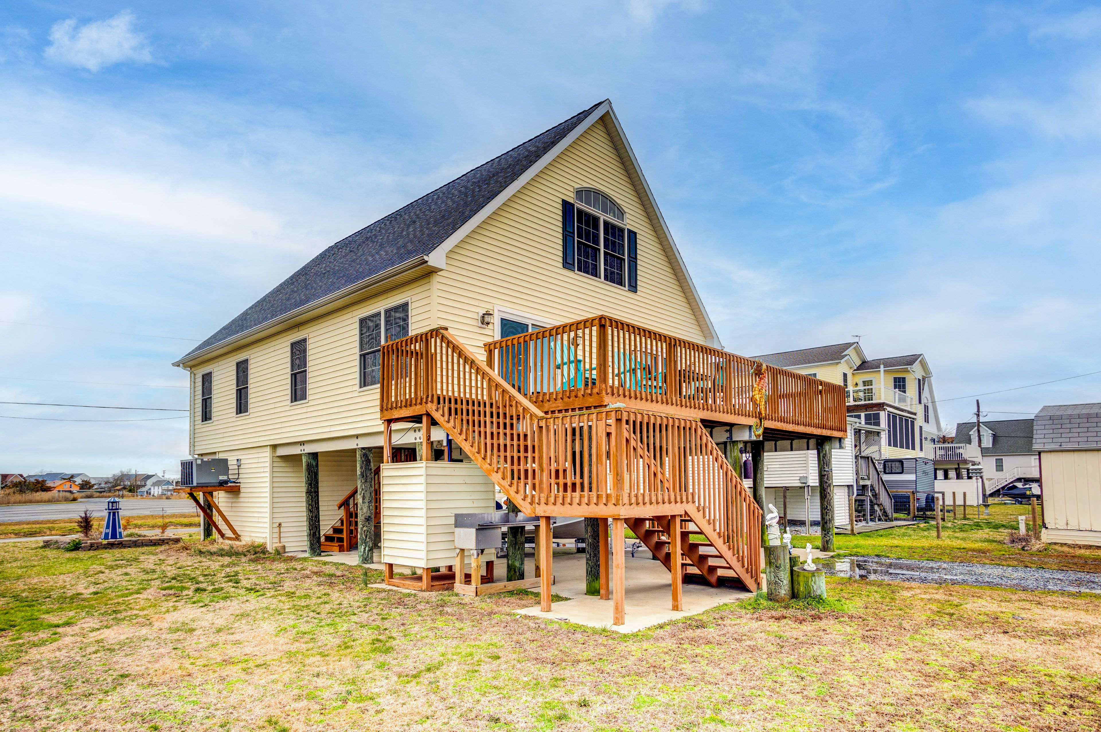 Parking | Gravel Driveway (3 Vehicles) | Covered Parking Under Home (2 Vehicles)