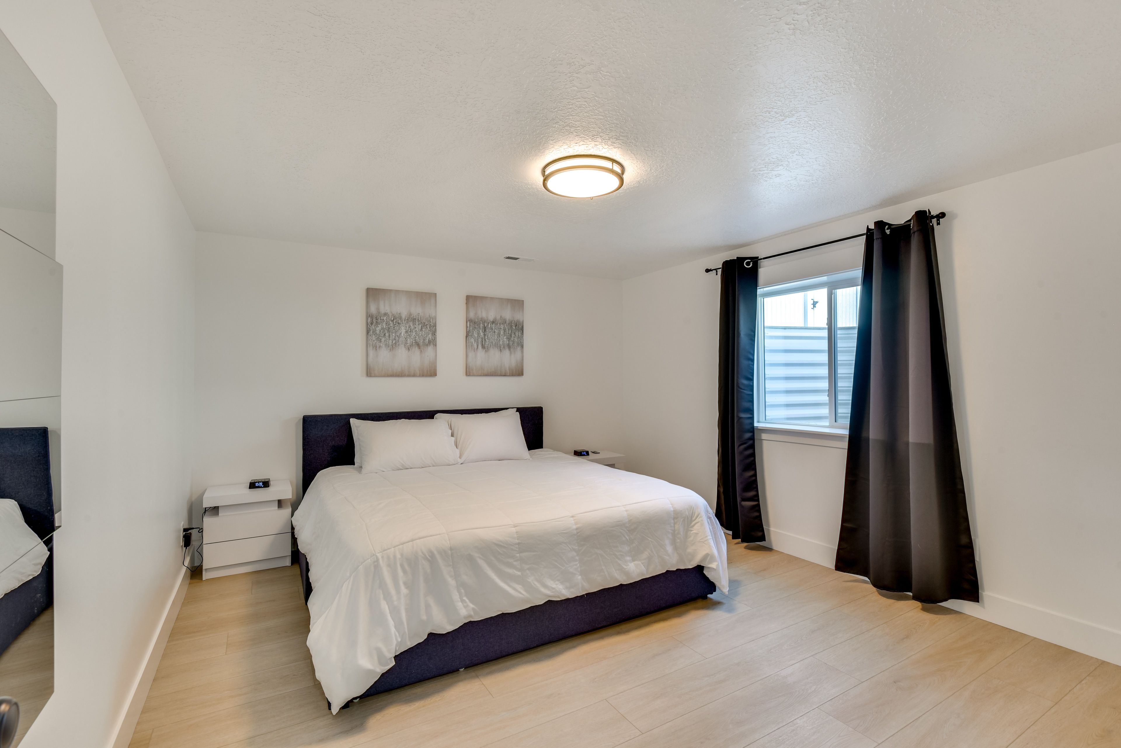 Bedroom 1 | Main Level | King Bed | Linens Provided | Full Length Mirror