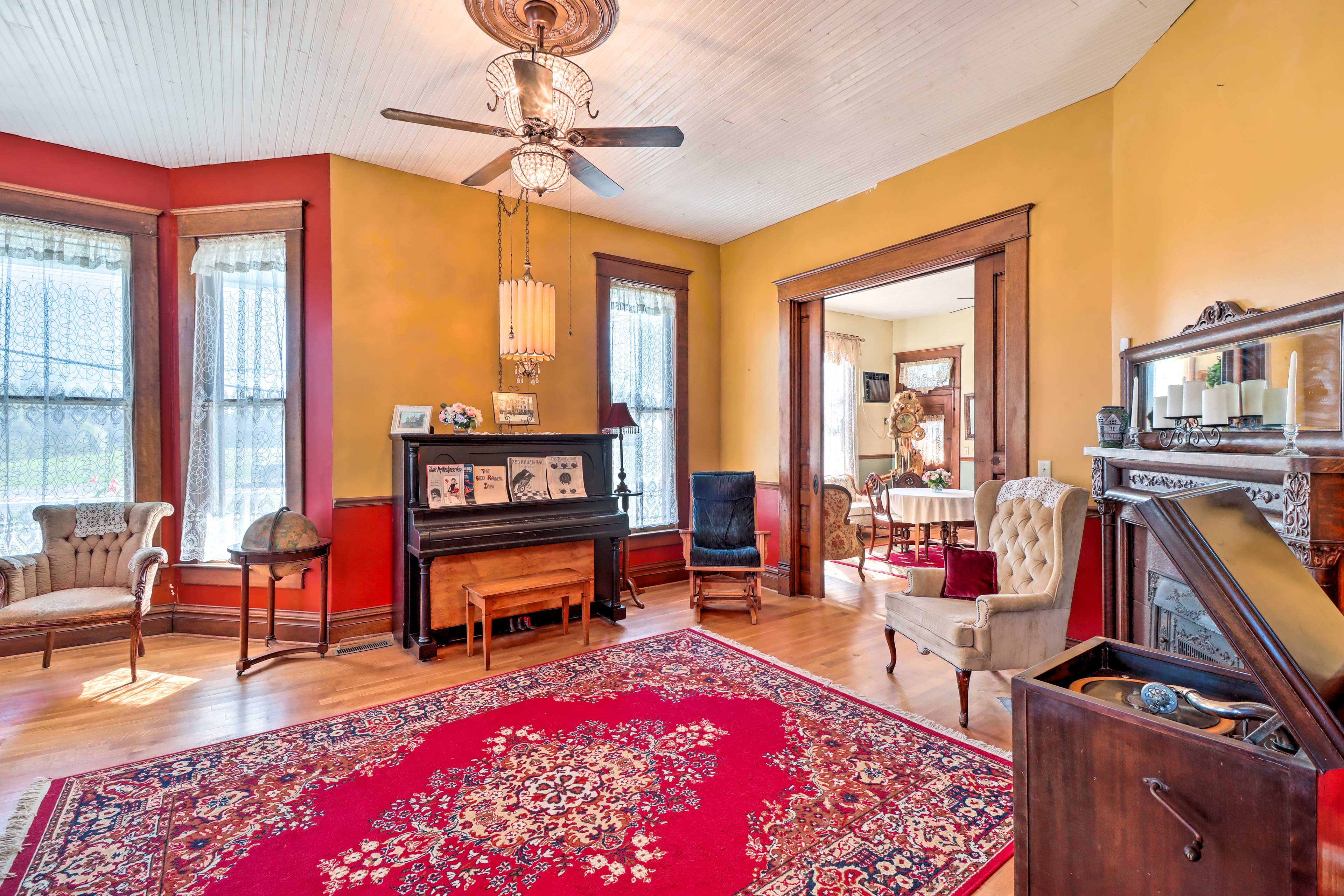 Parlor 1 | Piano | Record Player | Seating