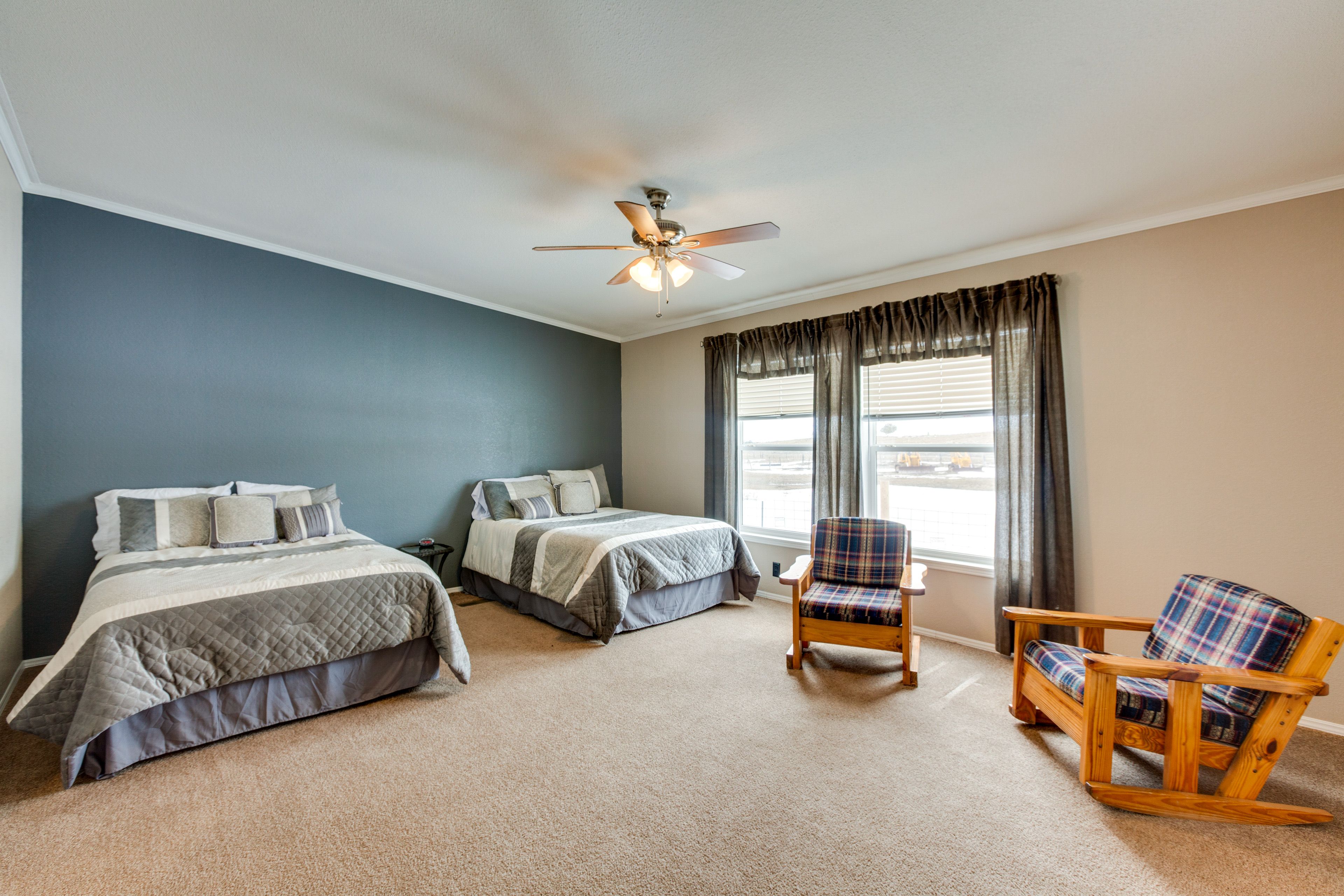 Bedroom 1 | 2 Full Beds | Linens Provided | En-Suite Bathroom