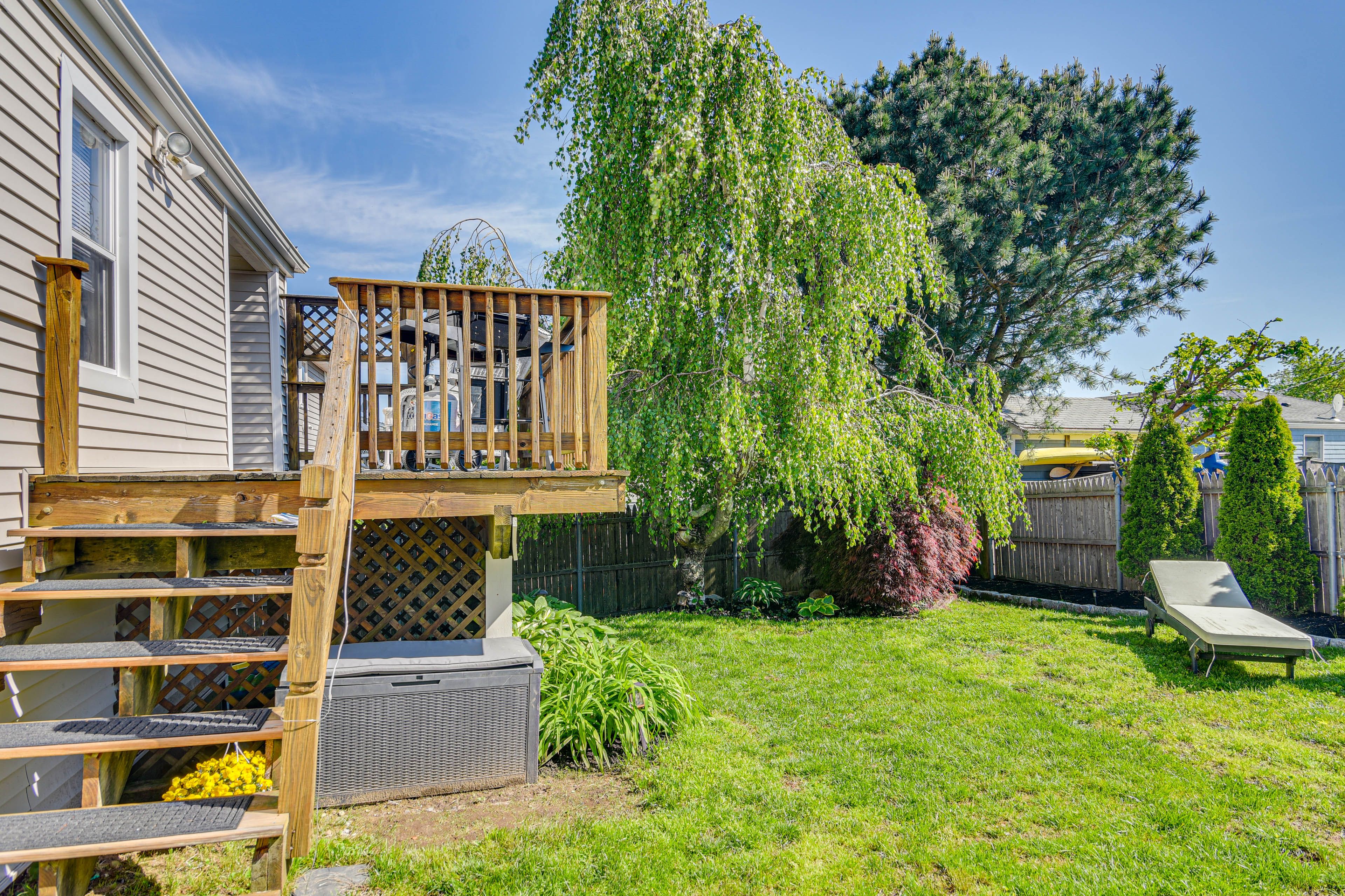 Home Exterior | Fenced Backyard | Patio | Dining Table | Chiminea