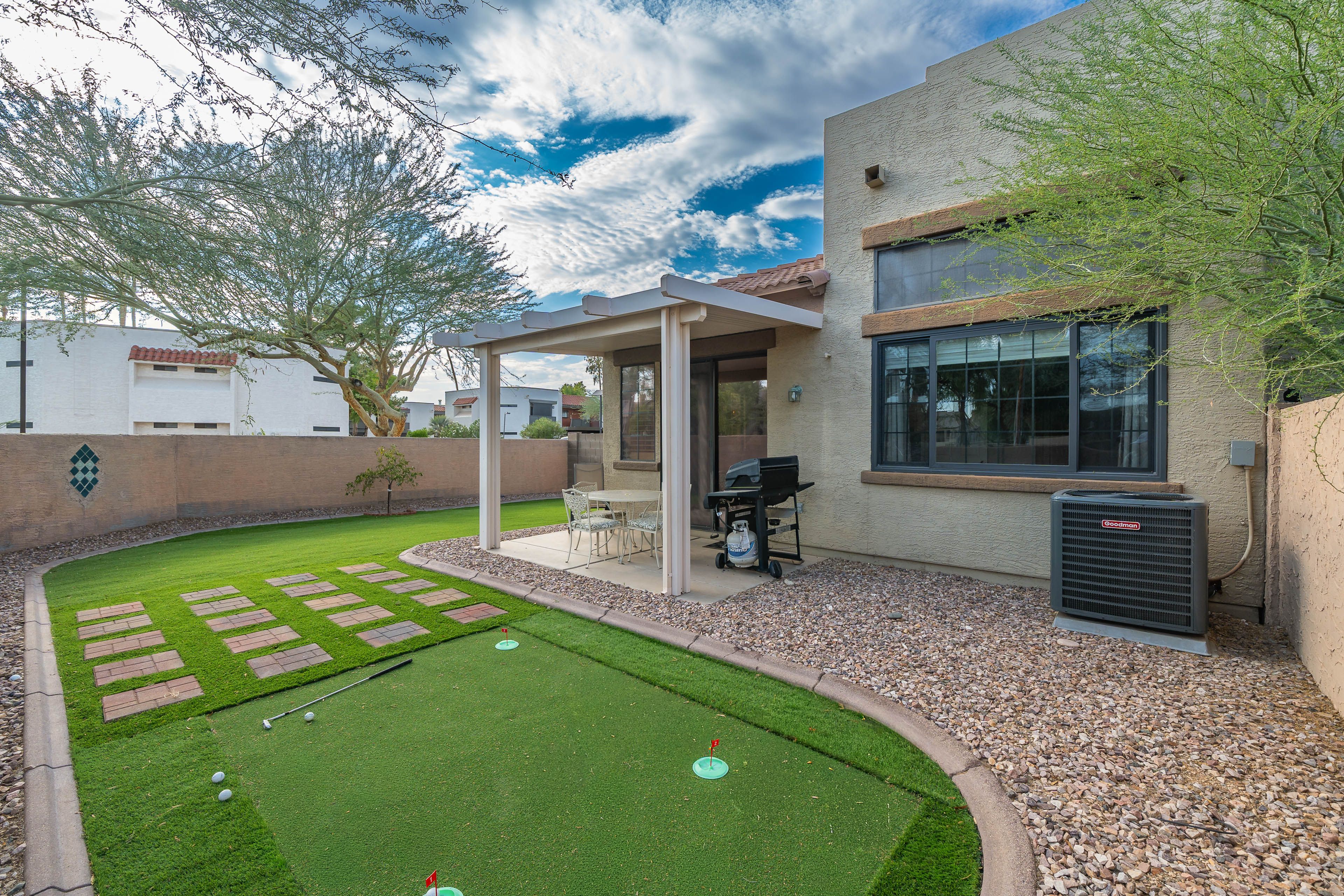 Covered Patio | Fenced-In Yard | Putting Green
