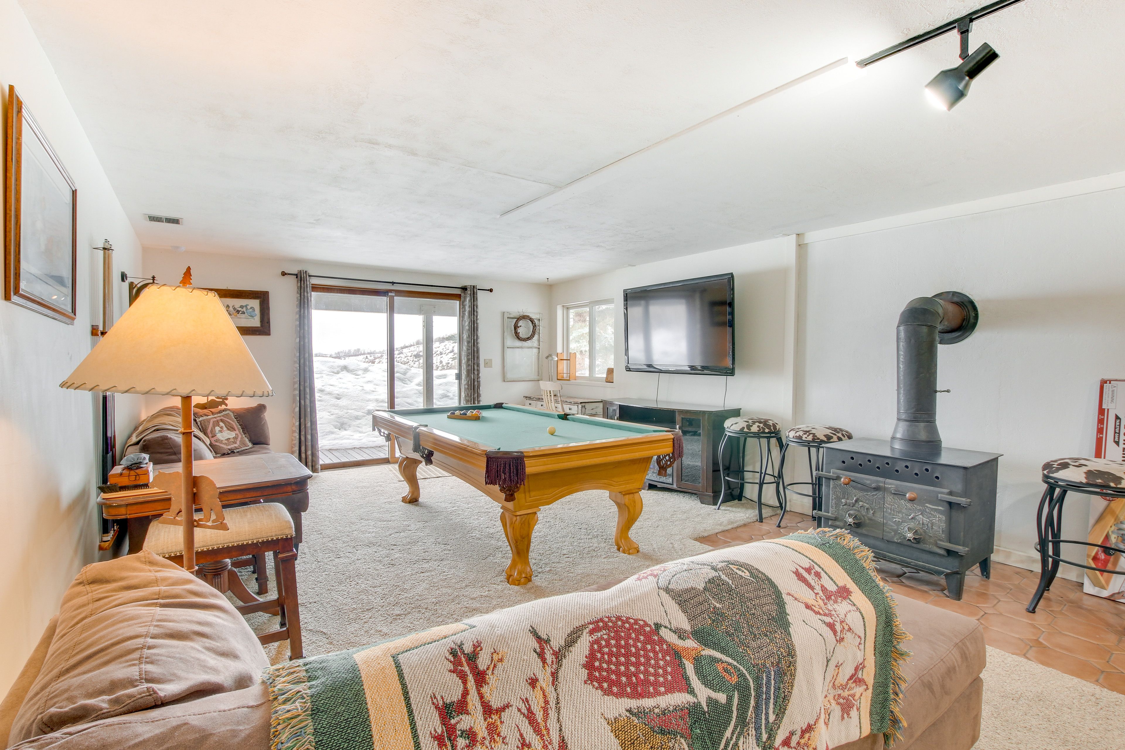 Den | Lower Level | Wood-Burning Fireplace | Pool Table Not Available