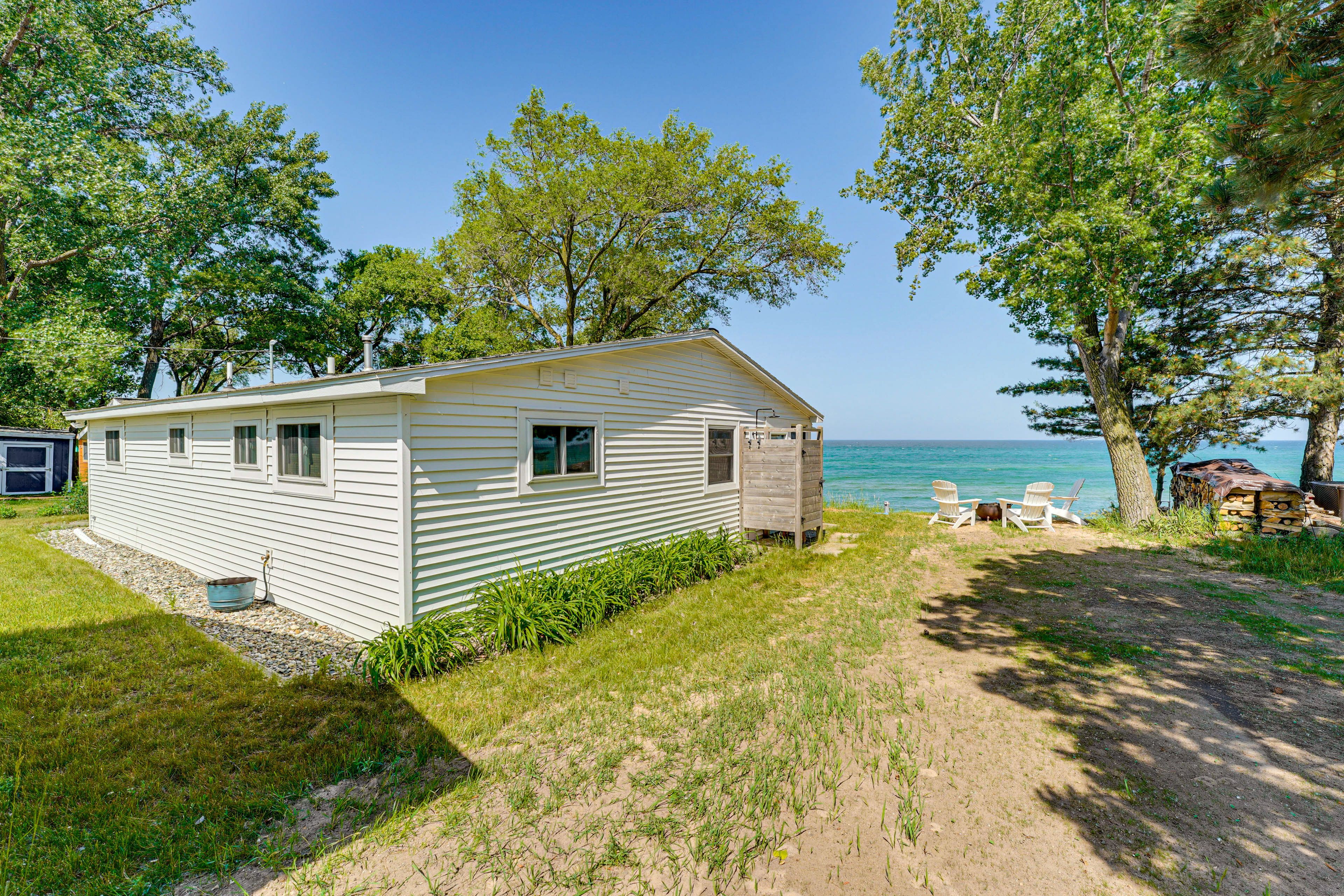 Home Exterior | Outdoor Shower | Wood-Burning Fire Pit | Adirondack Chairs
