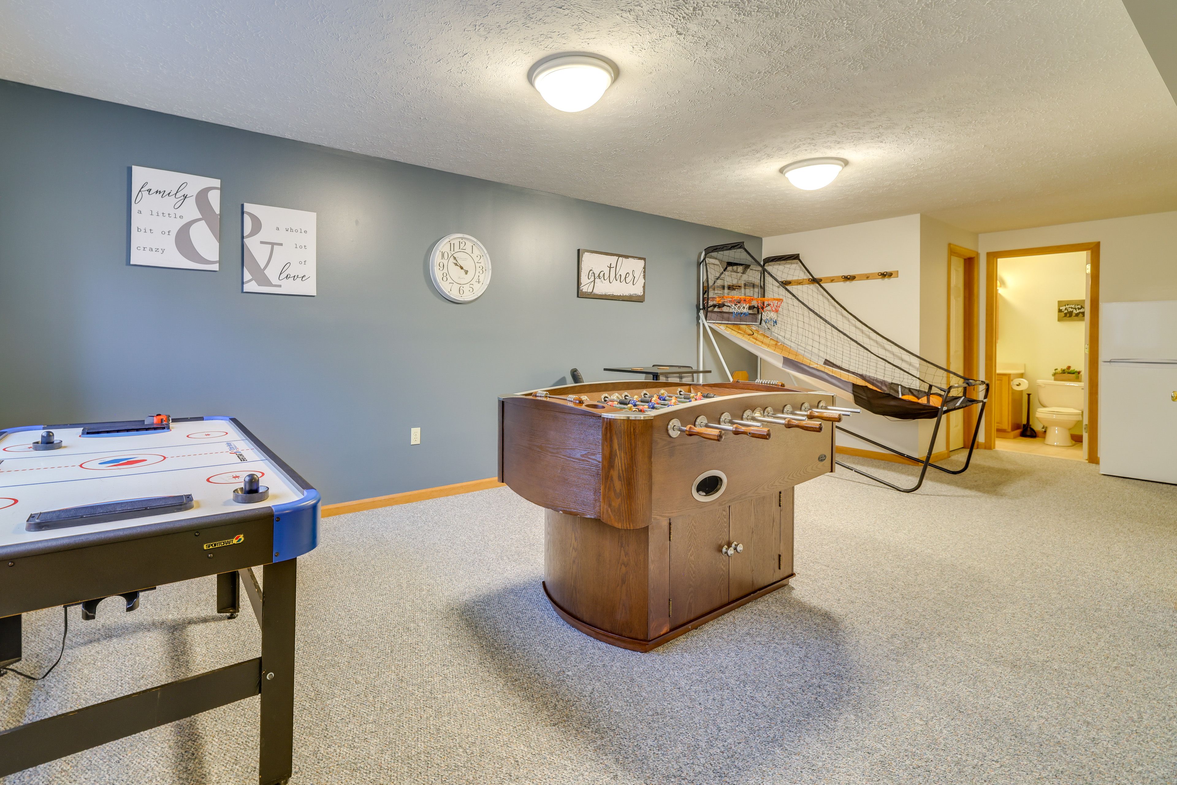Basement | Foosball & Air Hockey Tables | Basketball Toss | Excercise Equipment