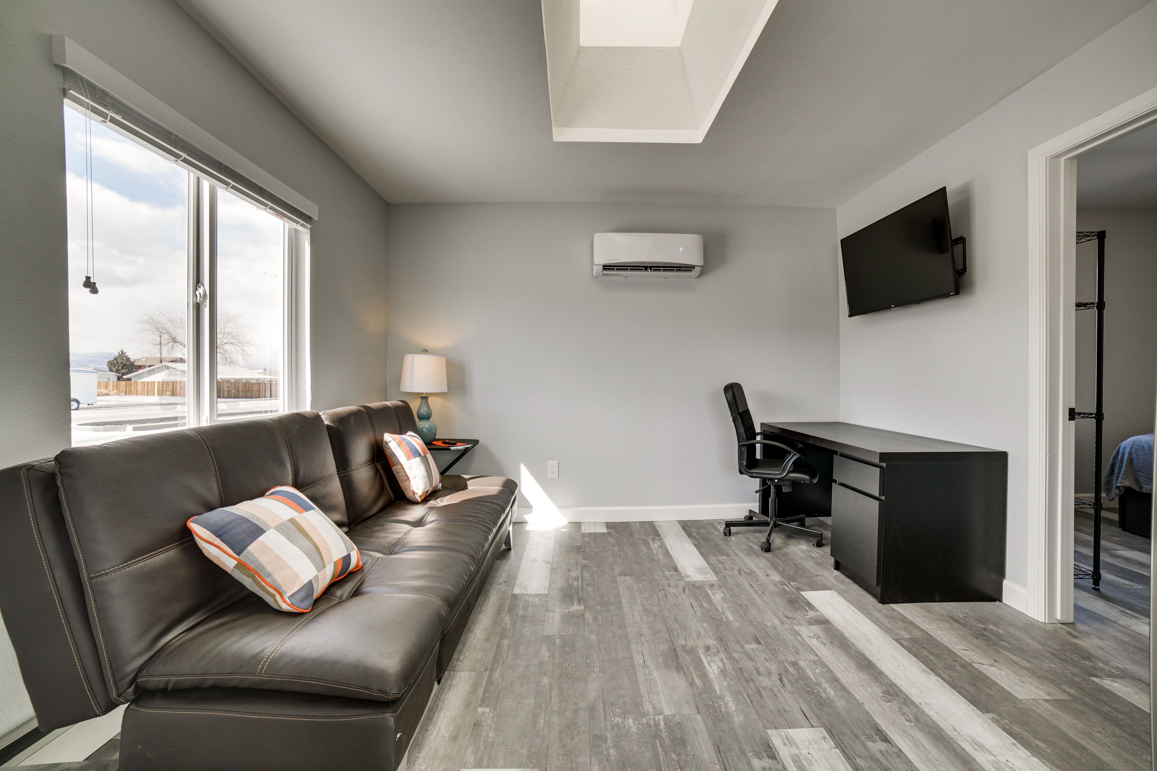 Living Room | Futon | Free WiFi | Mini Split A/C Unit | Smart TV