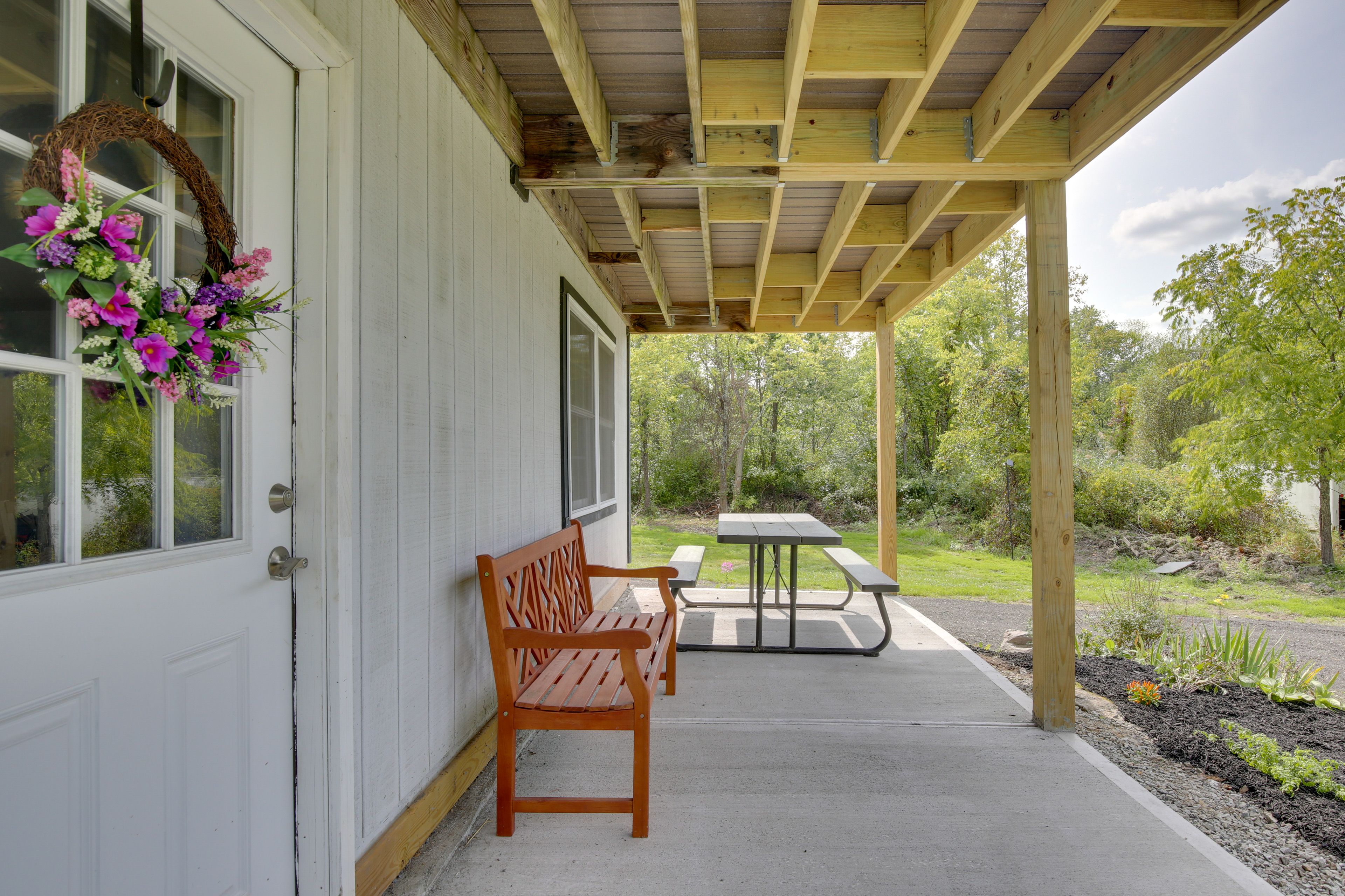 Cabin Exterior | Furnished Patio | Dining Area