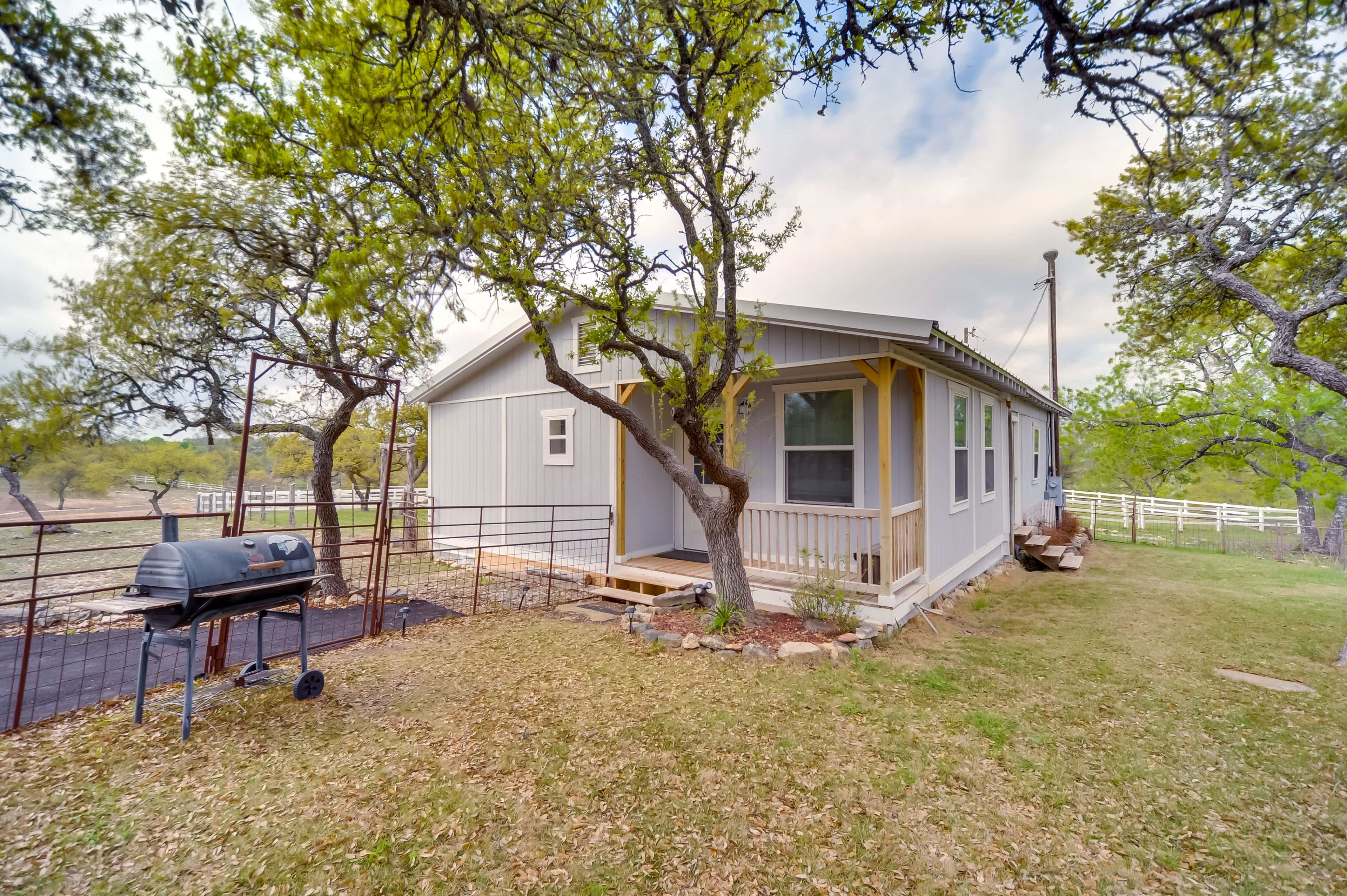 Exterior | Fenced Yard | Pet Friendly w/ Fee | Charcoal Grill