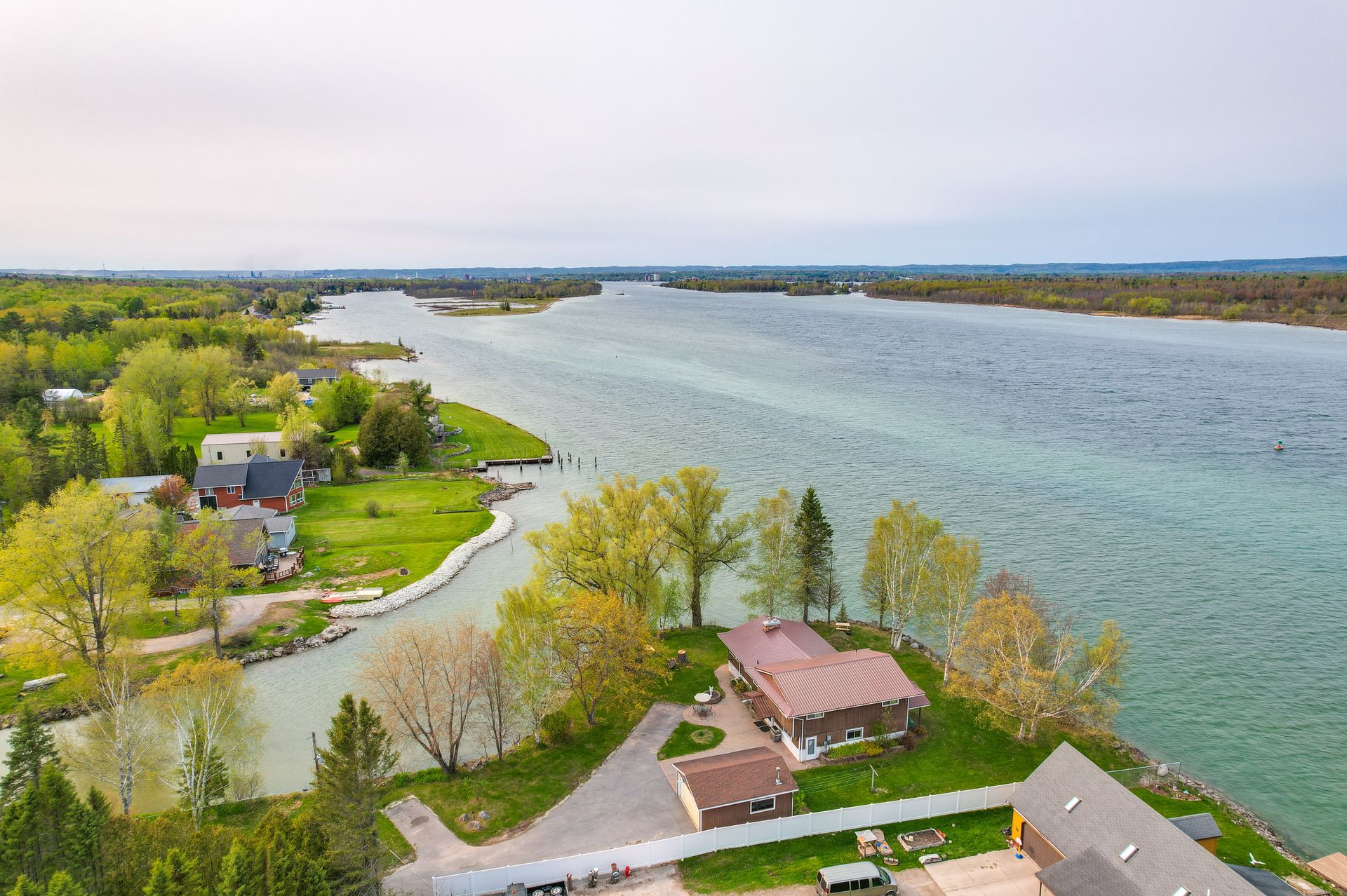 Riverfront Sault Ste Marie Home — 2BR, 2BA, 2,800 sq ft with dock