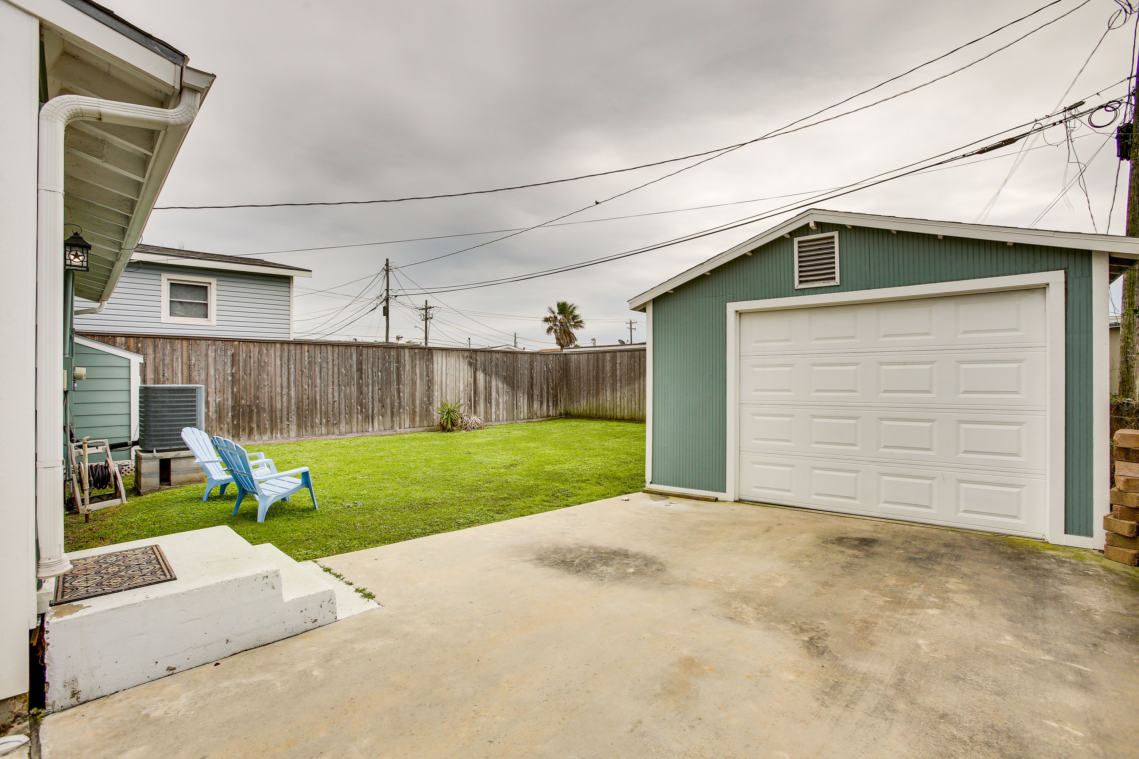 Fully Fenced Backyard w/ Metal Security Gate