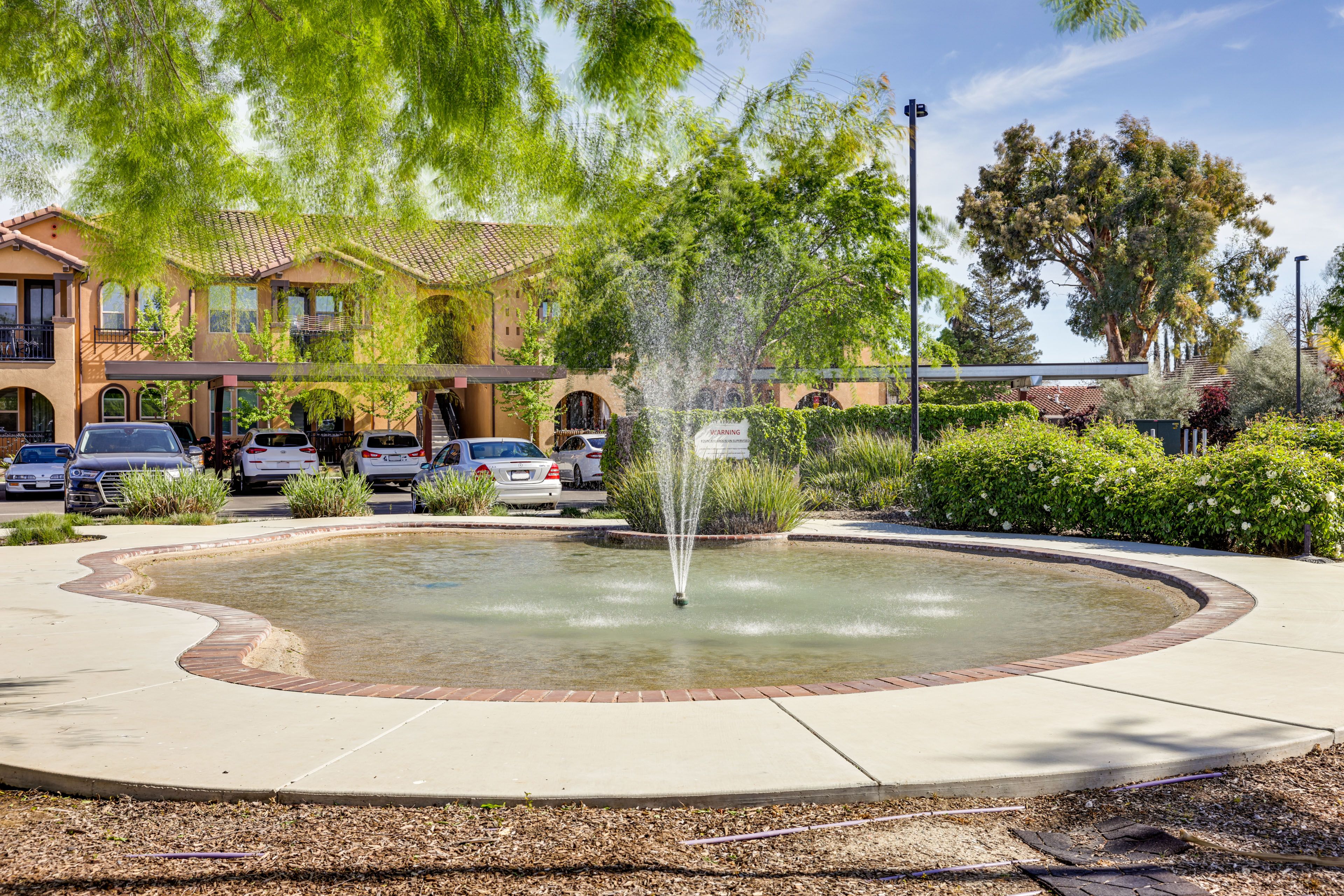 Condo Exterior | Community Splash Area | Community Fitness Center
