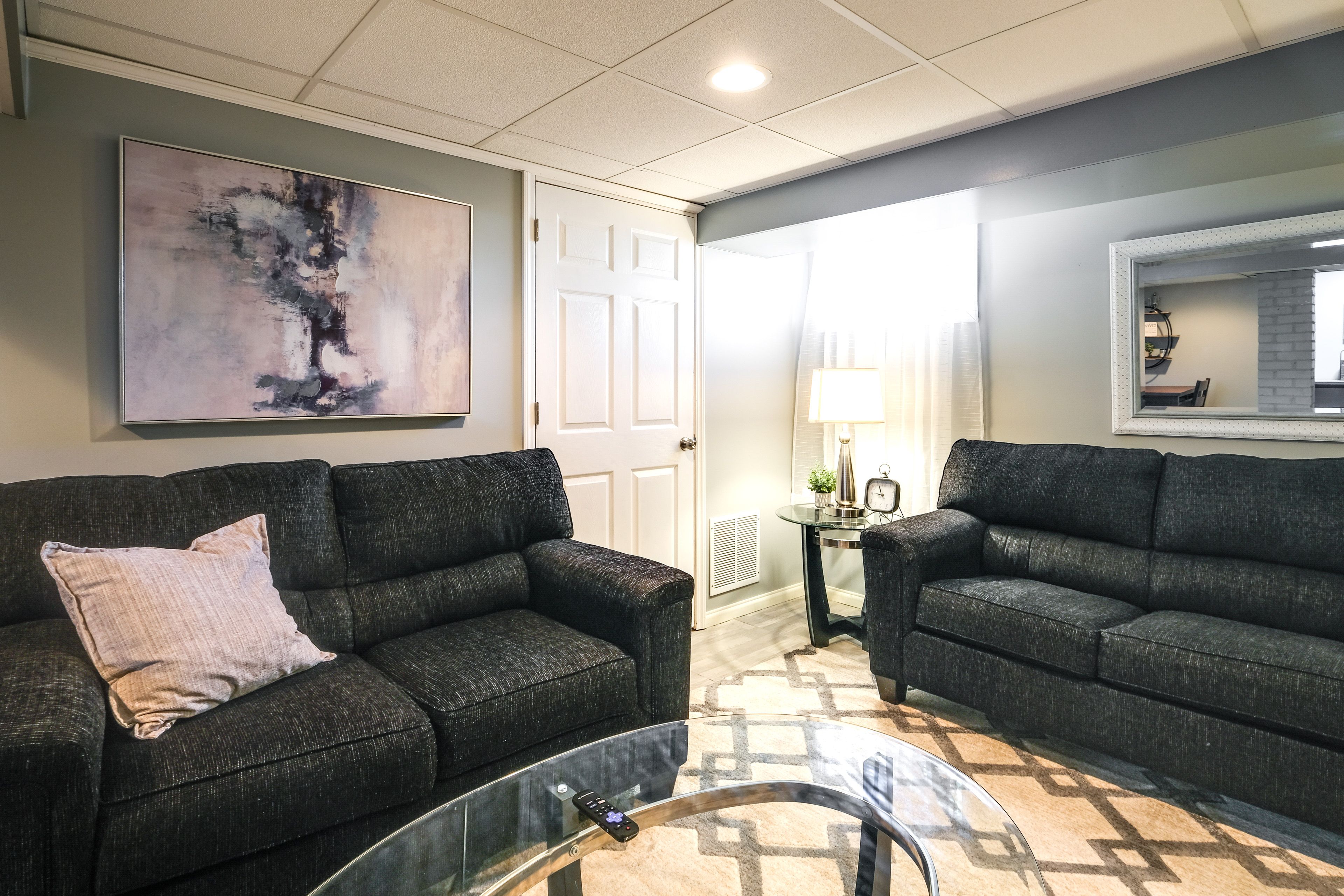Living Room | Queen Sleeper Sofa | Central Air Conditioning | Heating Unit