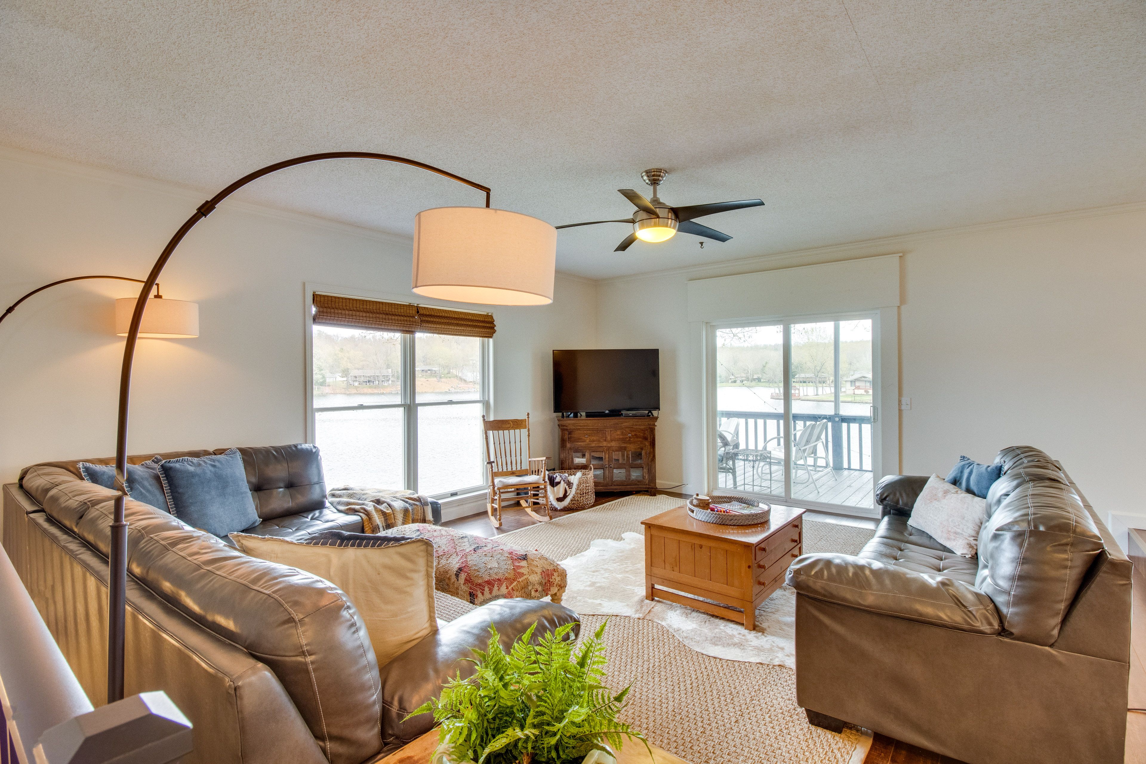 Living Room | Smart TV | Central Heating & A/C | Ceiling Fans | Deck Access