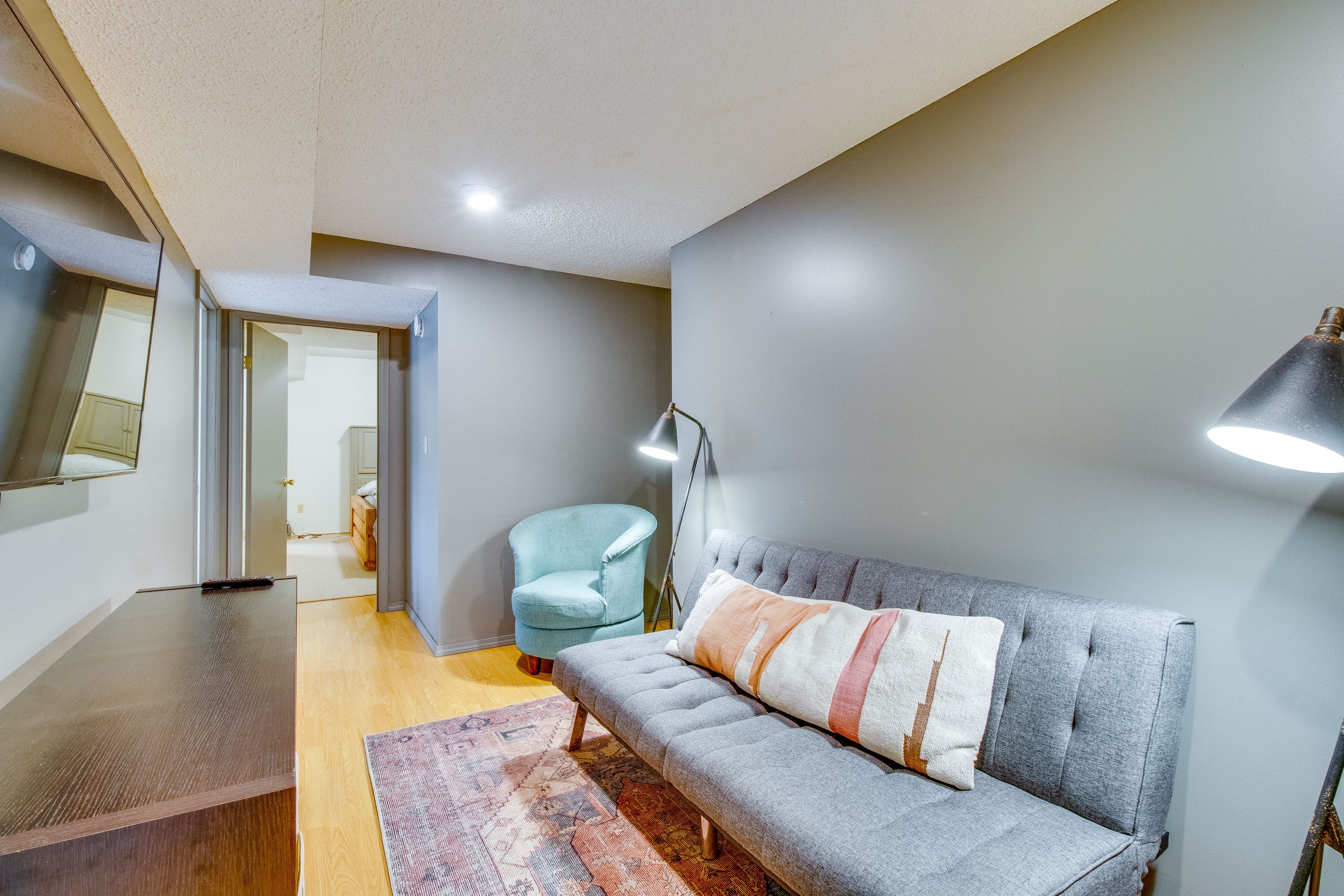 Basement Living Area | Futon | Smart TV | Board Games