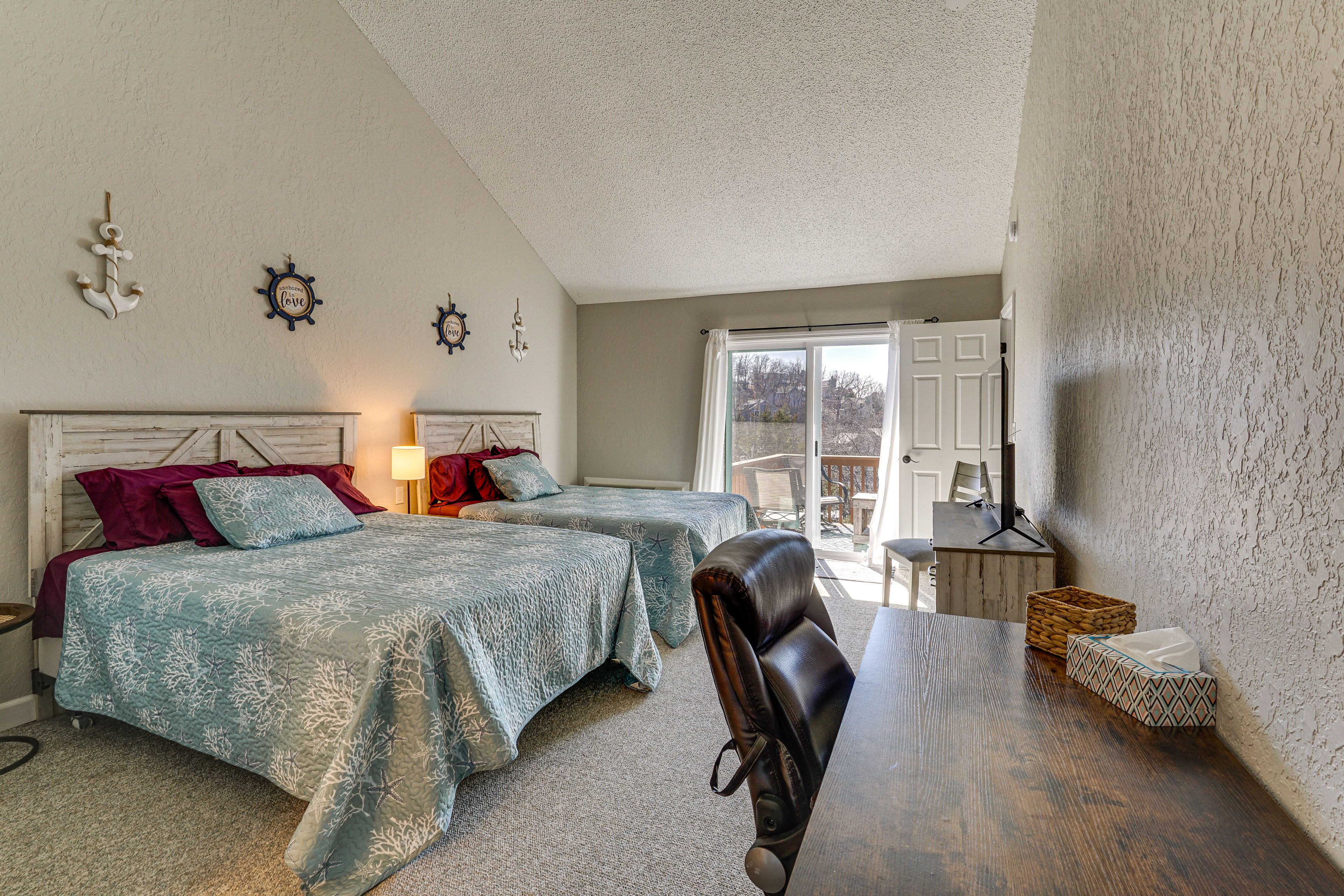 Bedroom 1 | 2 Queen Beds | Linens Provided | Work Desk | Balcony | Main Level