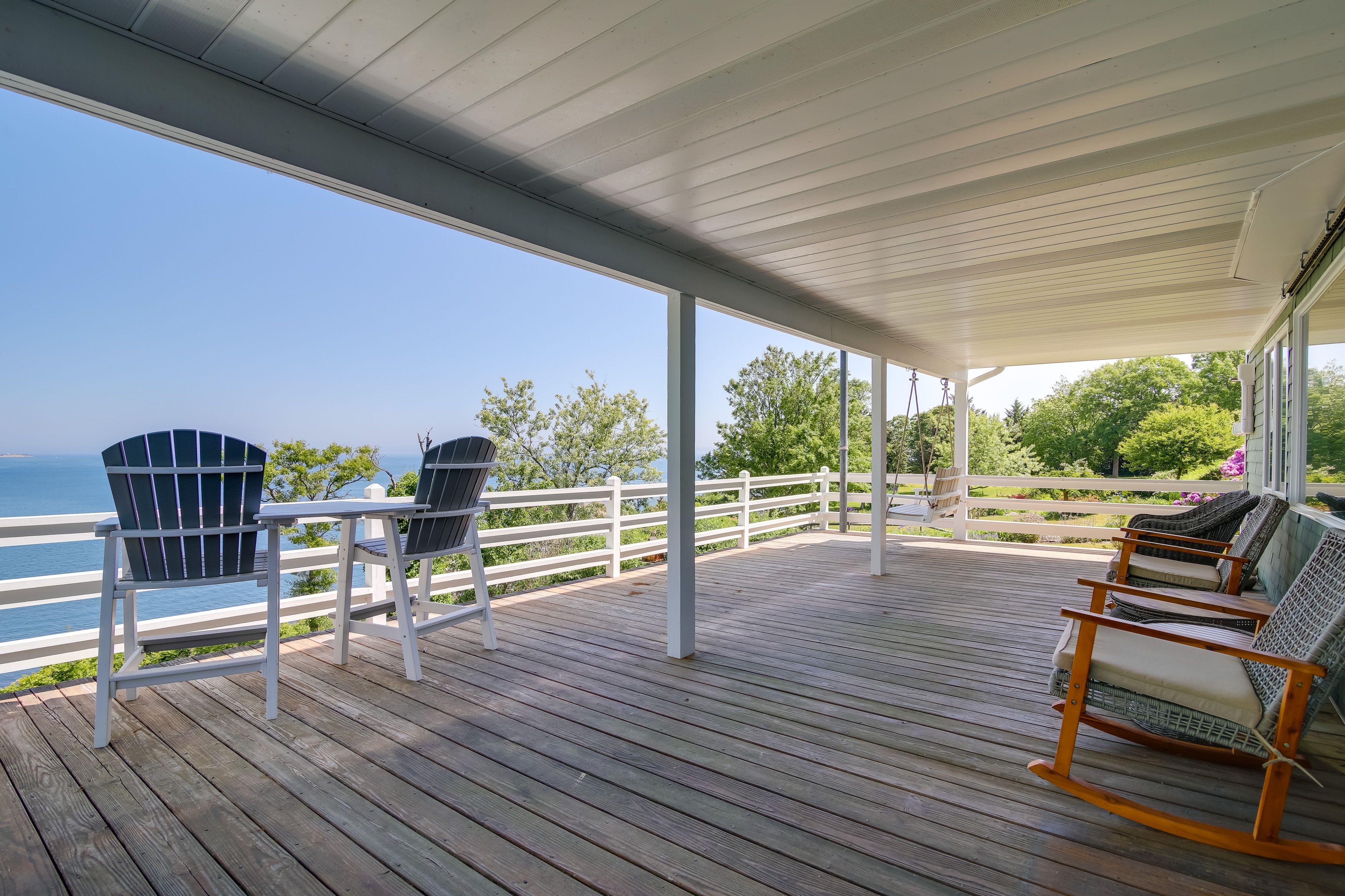 Main-Level Deck | Rocking Chairs | Bench Swing | Bay Views