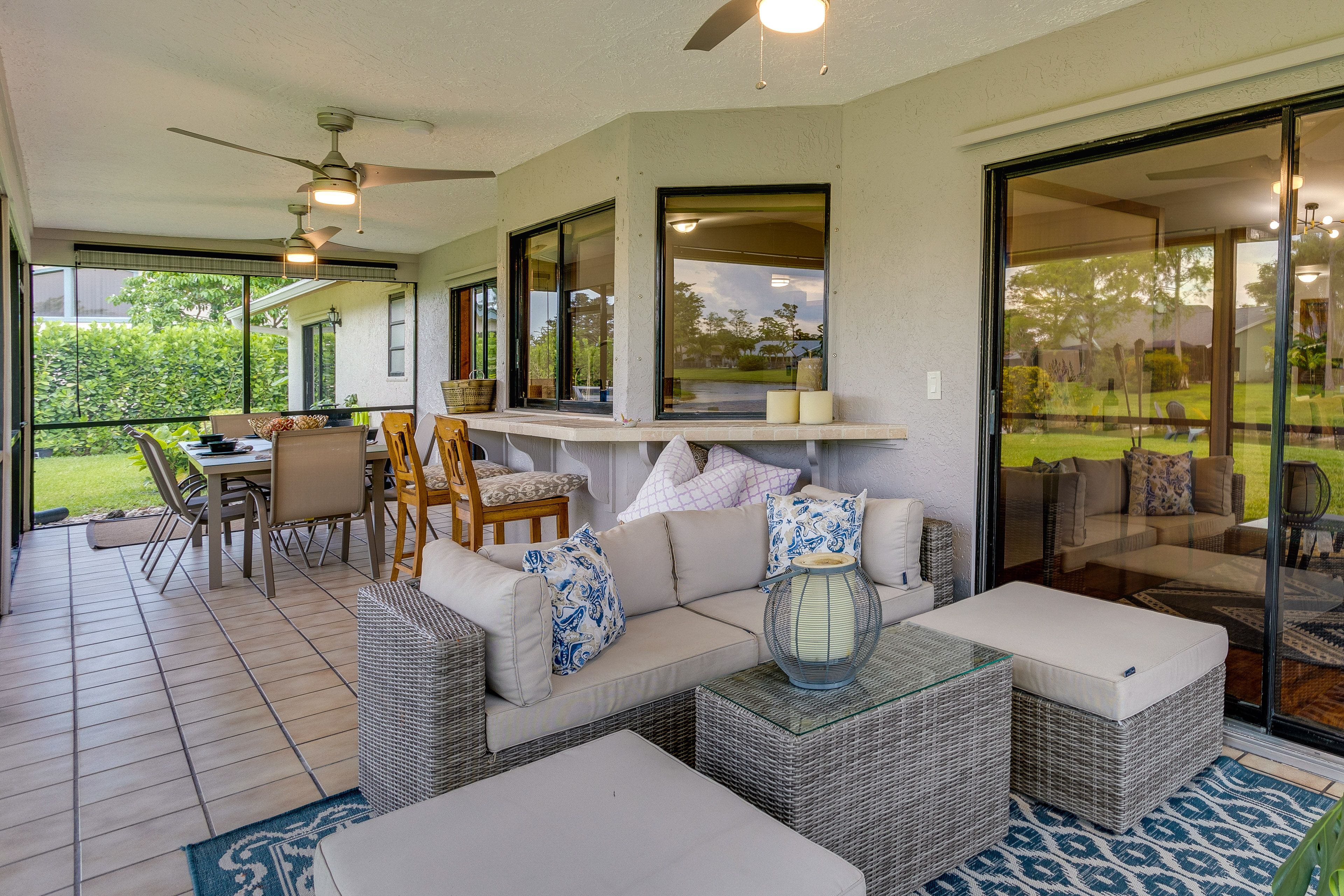 House Exterior | Screened Patio | Dry Bar | Dining Area