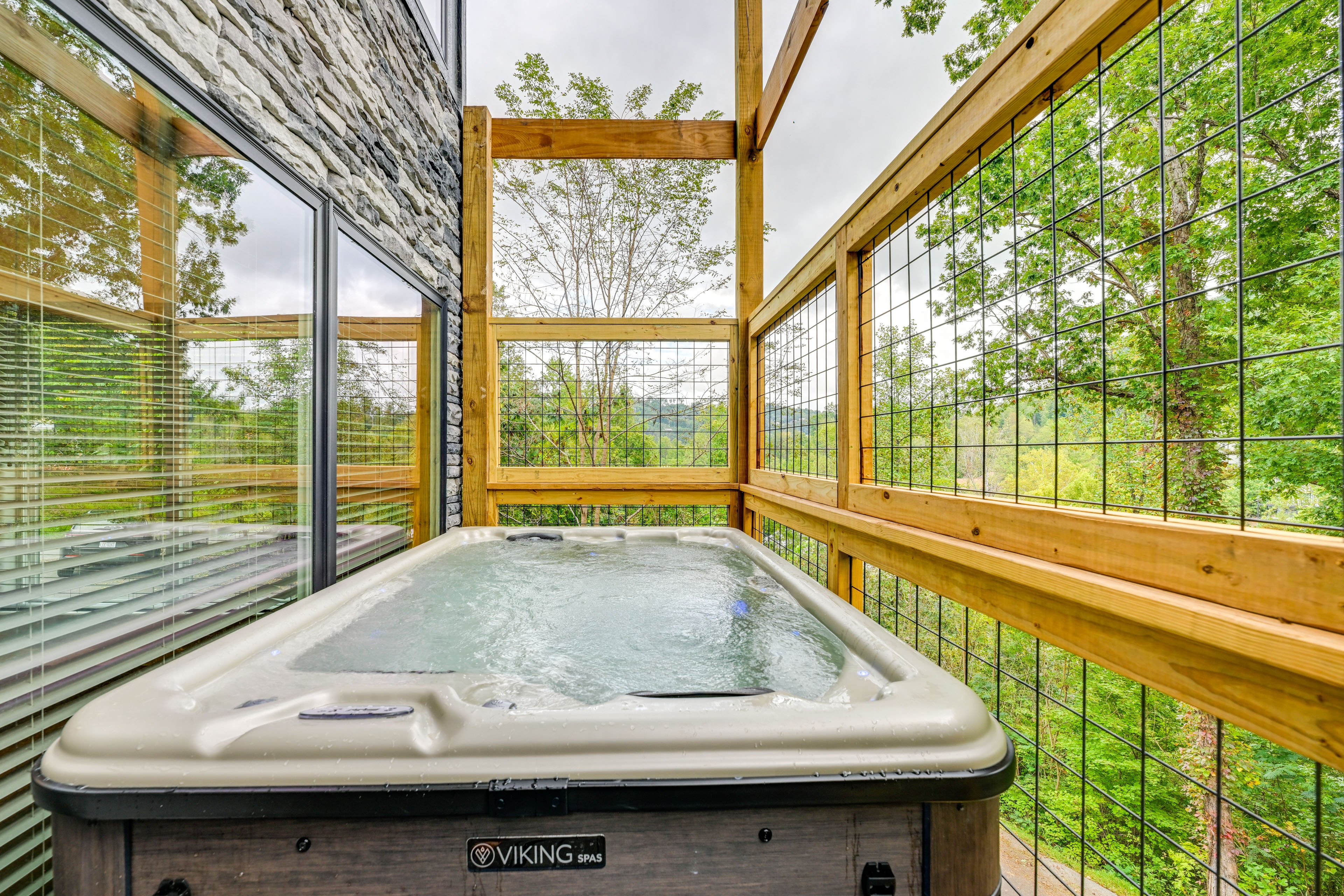 Property Exterior | Private Hot Tub | Furnished Balconies