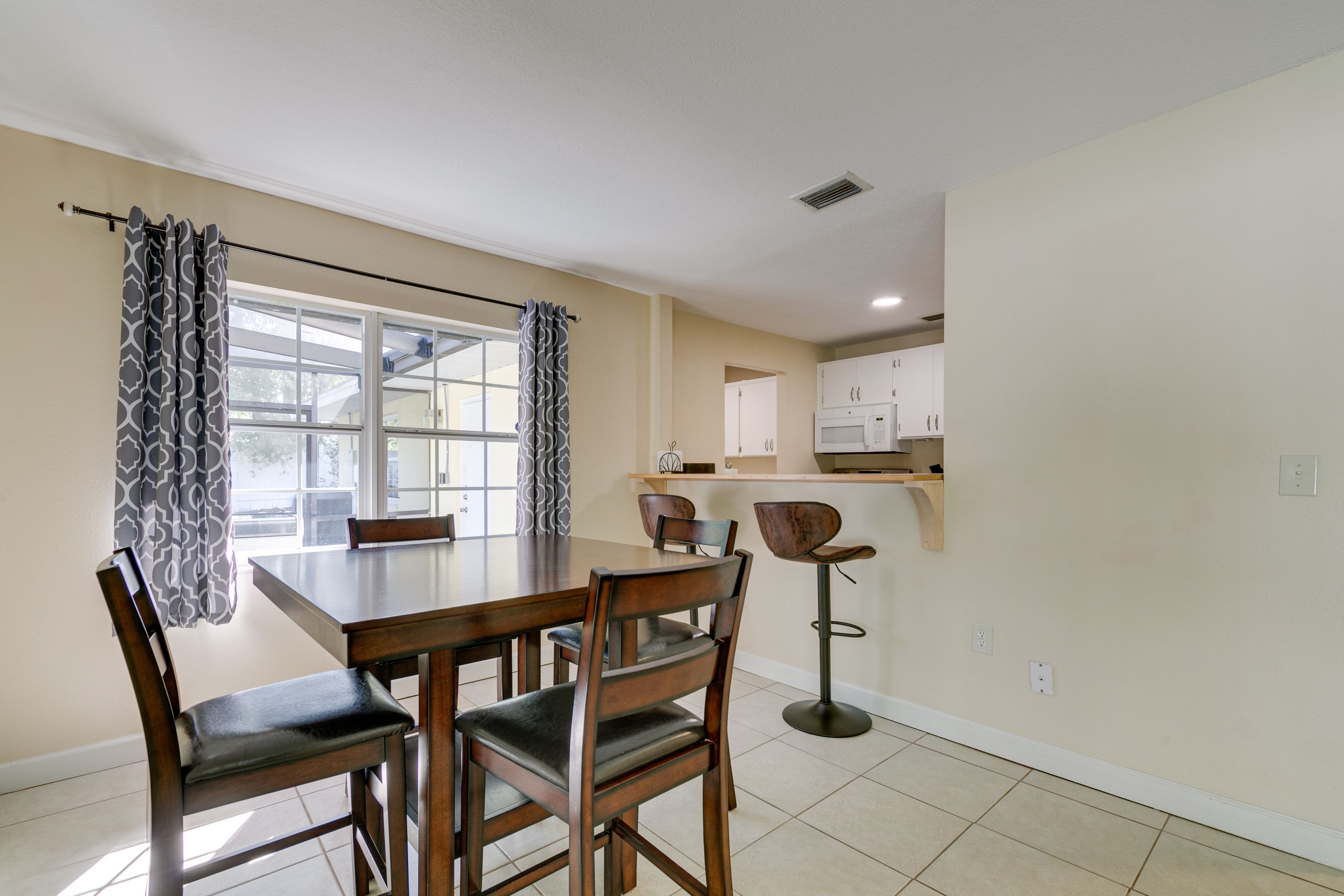 Dining Room | Breakfast Bar | Dishware & Flatware Provided