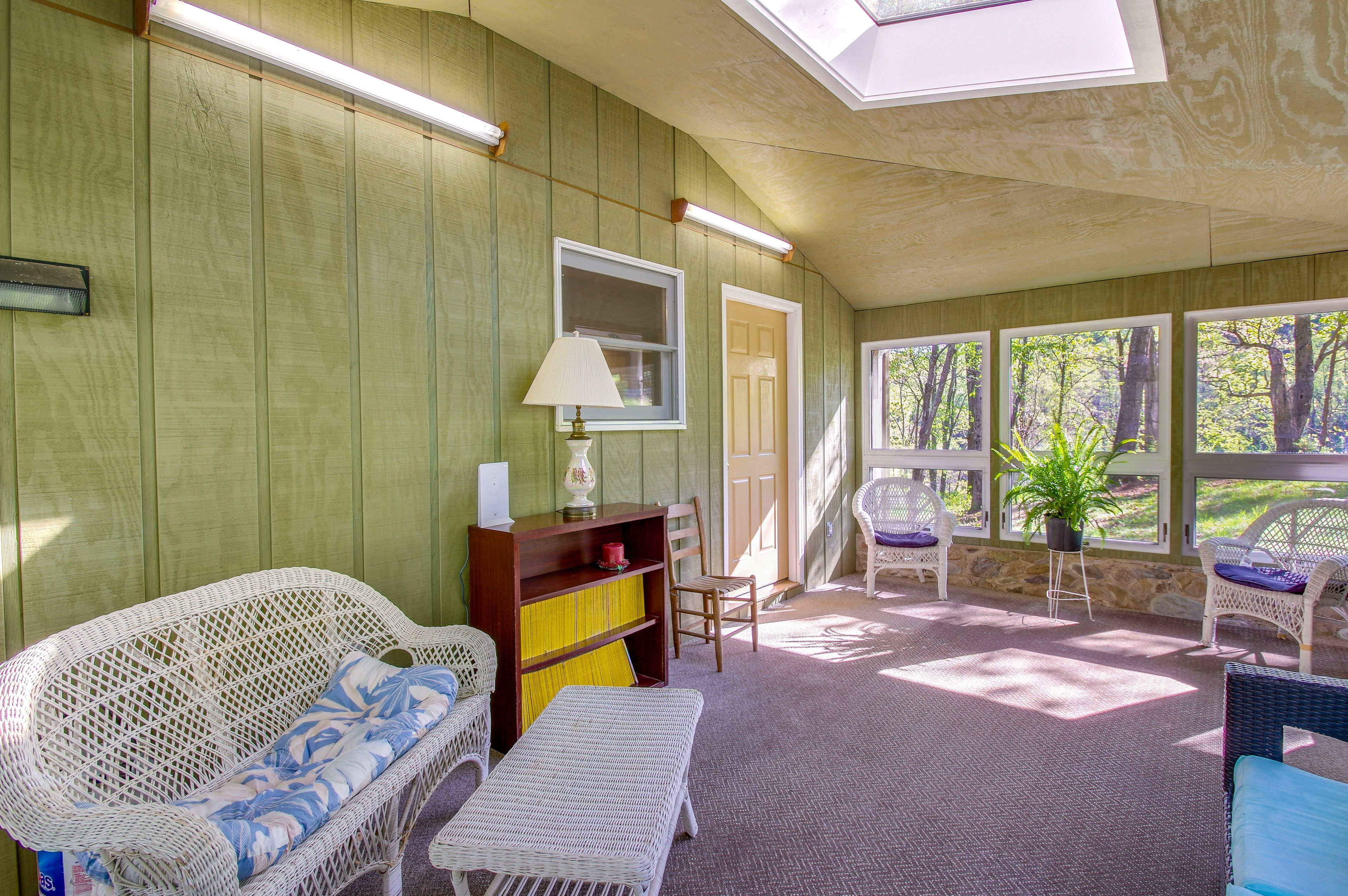 Enclosed Sunroom | Decorative Fireplace