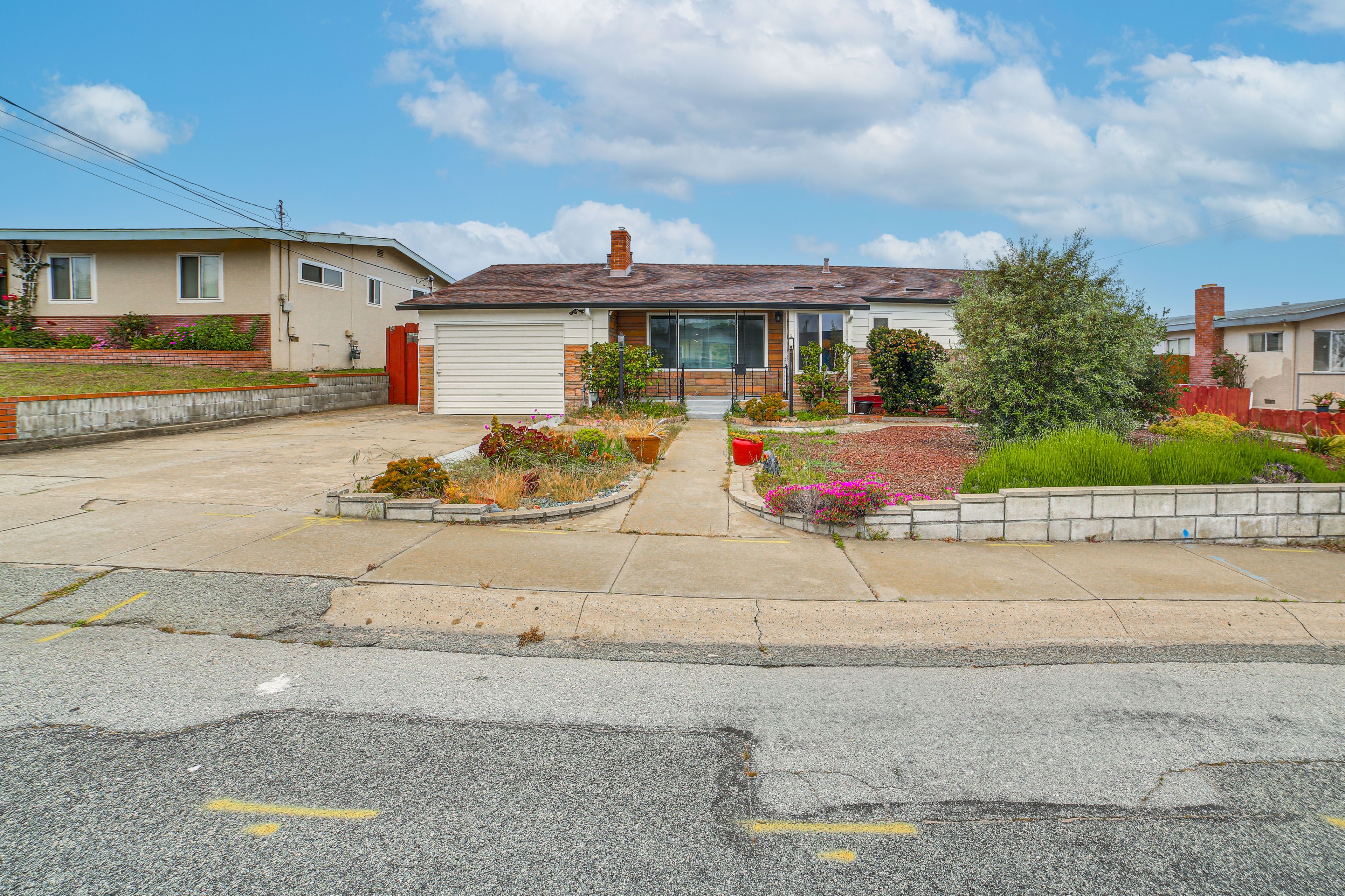 Parking | Driveway (2 Vehicles) | Free Street Parking (First-Come, First-Served)